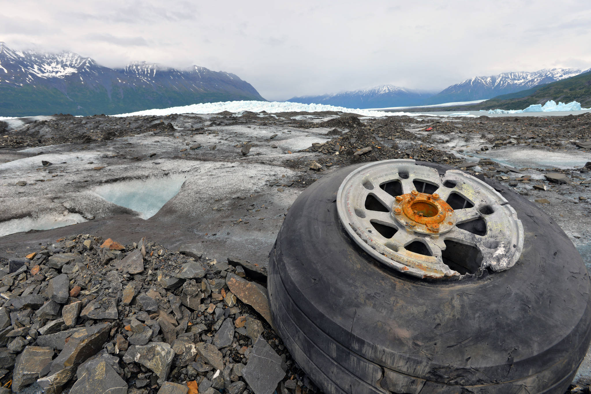 Landing gear from a 1952 C-124 Globemaster II aircraft accident rests on top of Colony Glacier June 10, 2015. Each summer since 2012 Alaskan Command has supported Operation Colony Glacier by removing aircraft debris and assisting in the recovery of human remains to ensure closure for families who have lost loved ones. (U.S. Air Force photo | Tech. Sgt. John Gordinier)