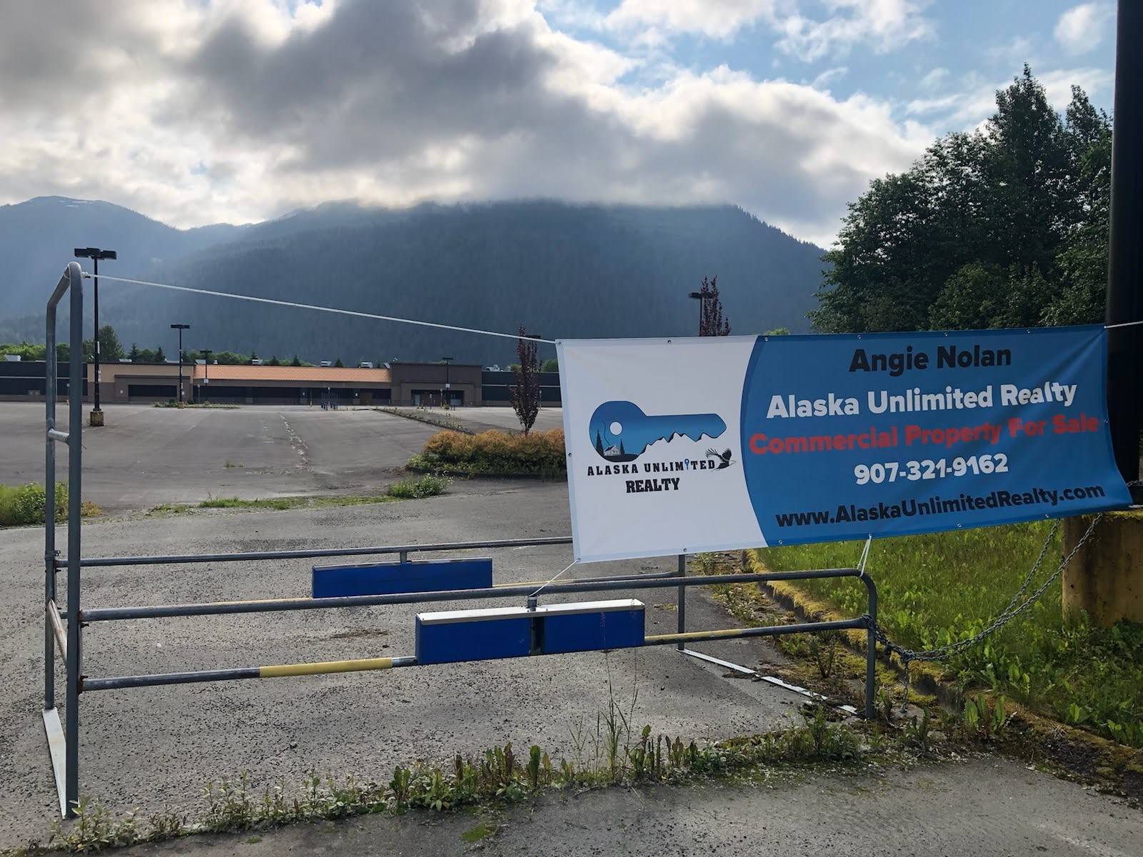 The former Walmart building, shown in this July 1 photo, located in the Lemon Creek area is for sale at a price about $2.3 million below its assessed value. (Peter Segall | Juneau Empire)