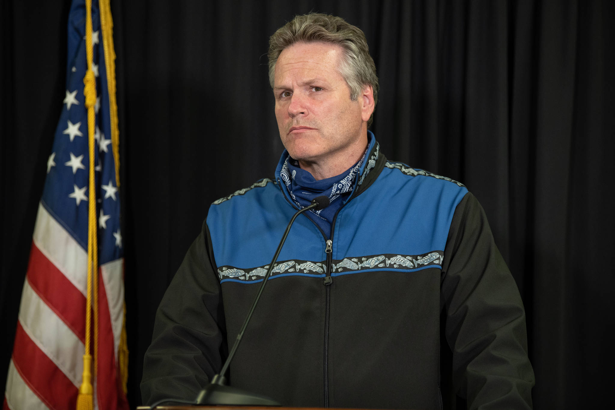 Gov. Mike Dunleavy wears a bandana while speaking at a June 30 press conference. (Courtesy Photo | Office of Gov. Mike Dunleavy)