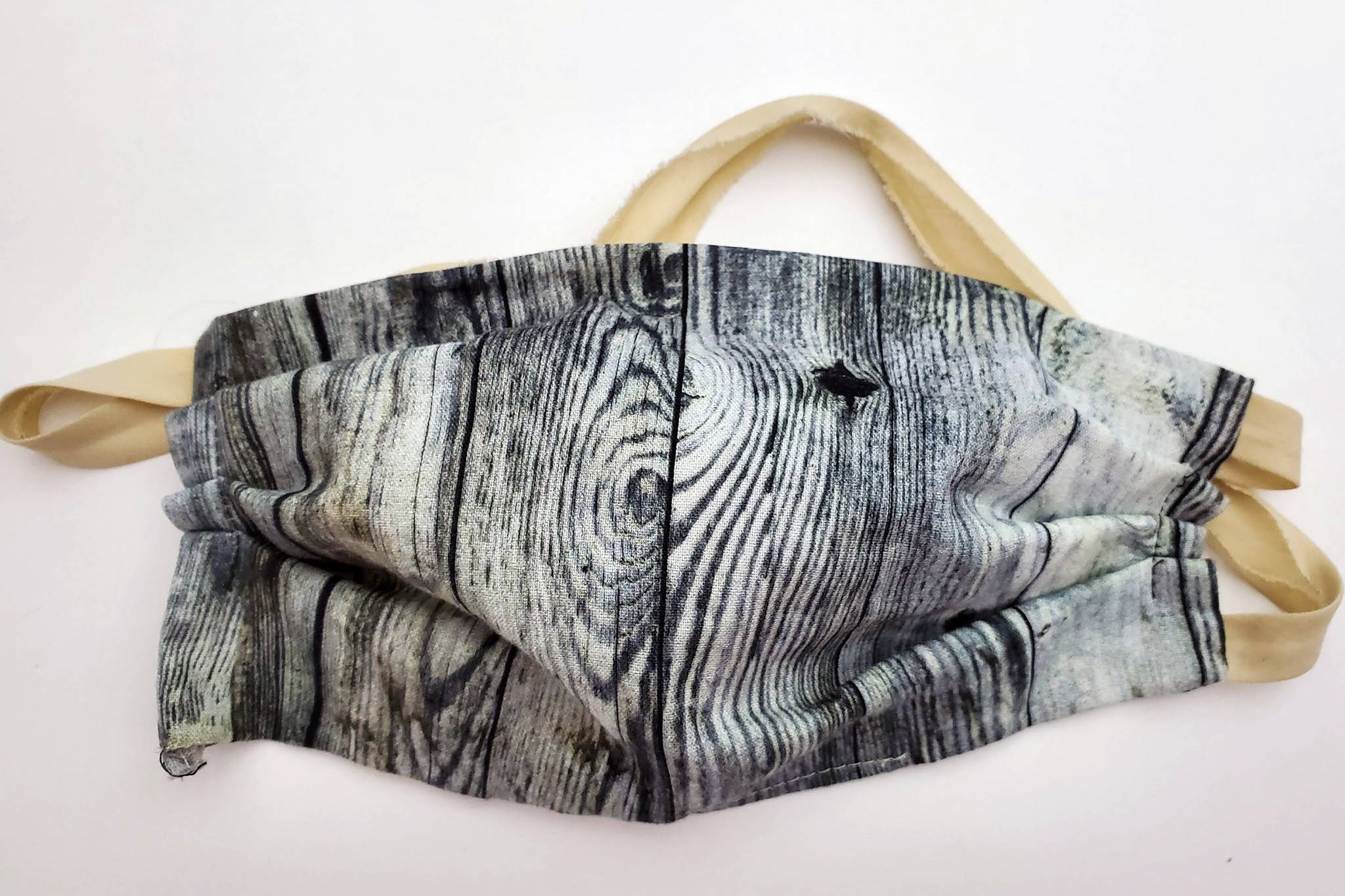 The Centers for Disease Control and Prevention, the governor and health care professionals advise wearing cloth face coverings, such as this one, to limit the spread of the coronavirus. (Ben Hohenstatt | Juneau Empire File)