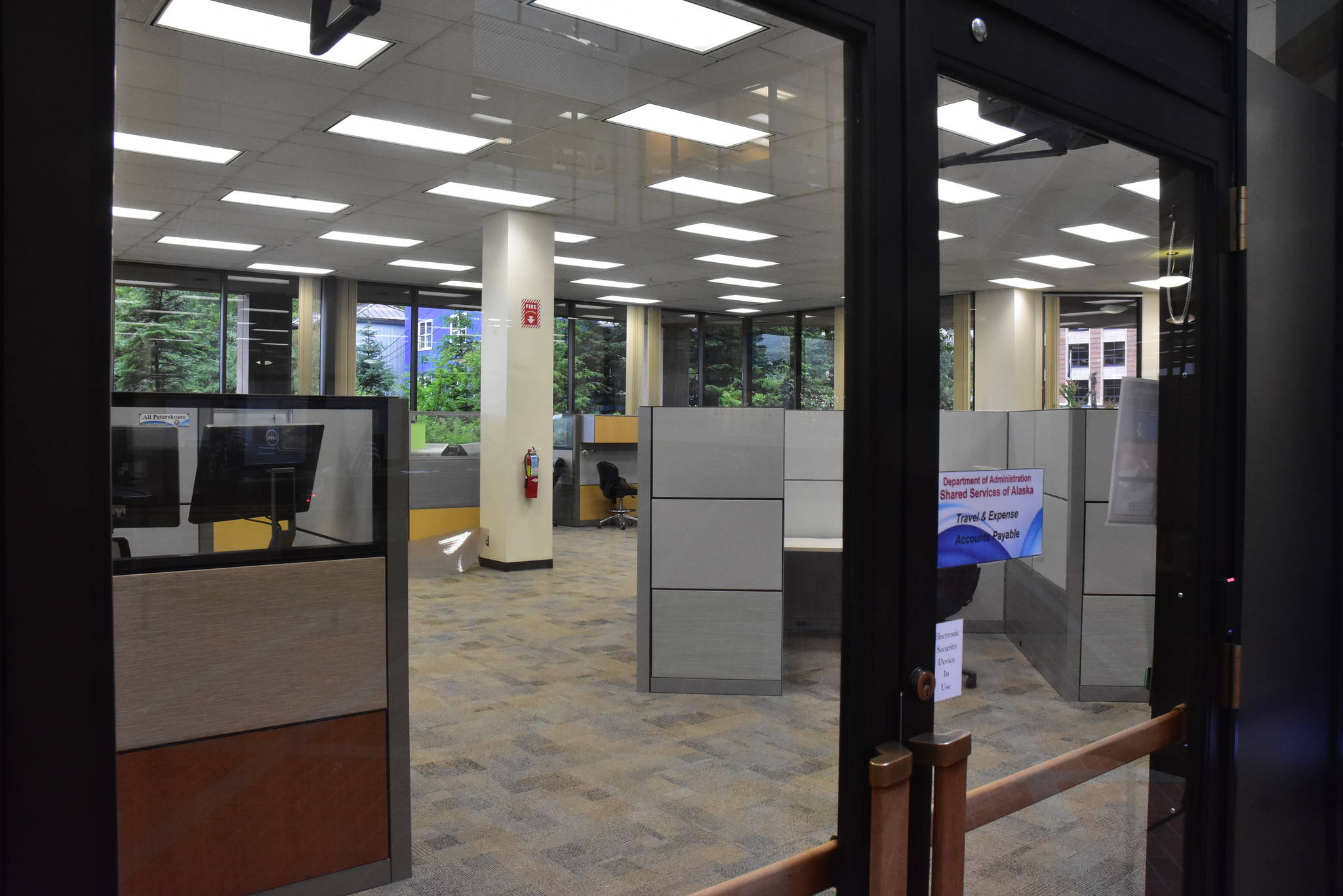 Empty cubicles at the State Office Building in Juneau on Thursday, July 9, 2020. The state now has thousands of workers telecommuting Department of Administration Commissioner Kelly Tshibaka but union leaders say without enforcement, workers are still being put in unsafe conditions. (Peter Segall | Juneau Empire)