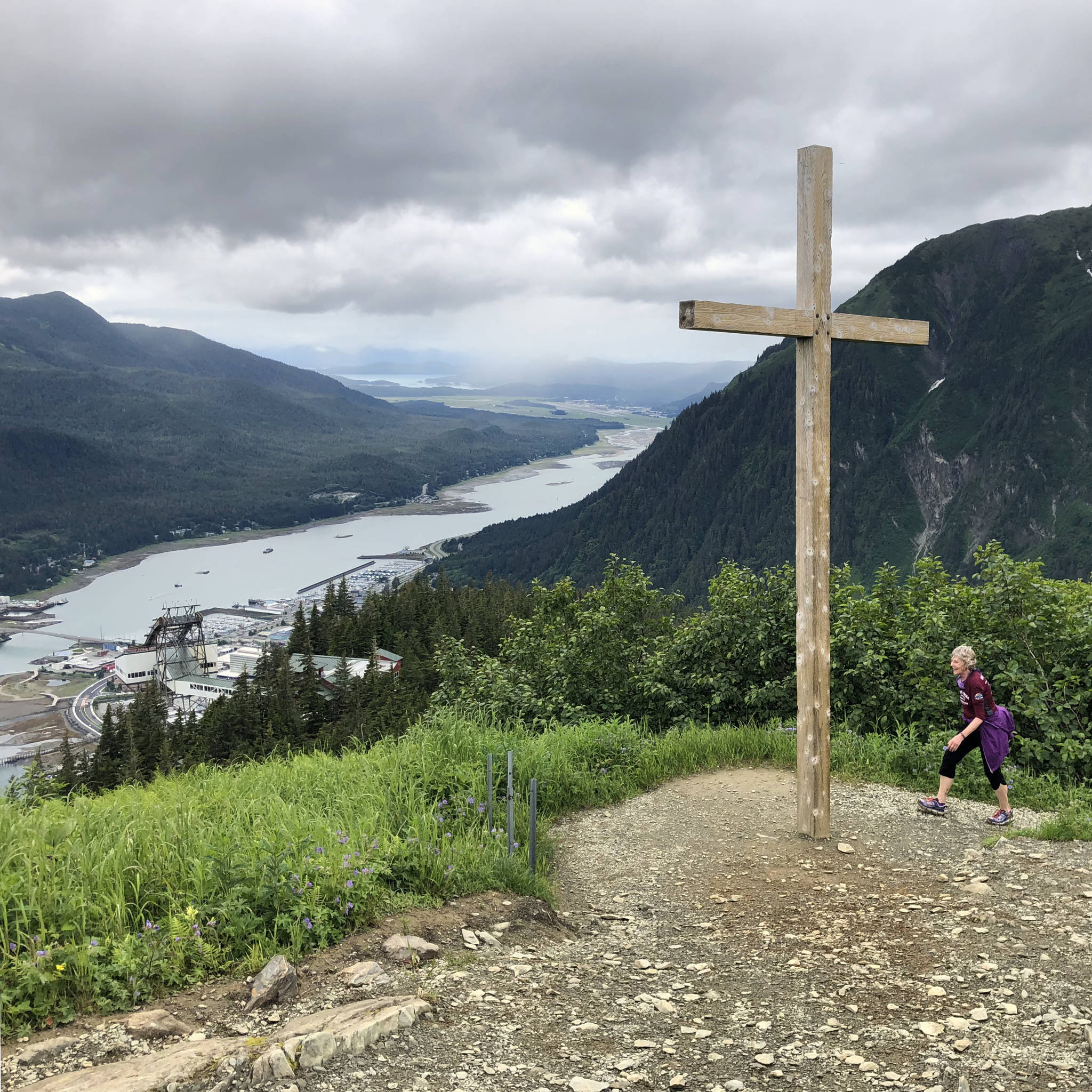 Linda Kruger approaches Father Brown’s Cross and the finish of the Juneau Trail and Road Runners Mount Roberts Tram Run on Mount Roberts Trail. The event sponsored annually by the Goldbelt Mount Roberts Tramway. (Courtesy Photo | Jeff Gnass)