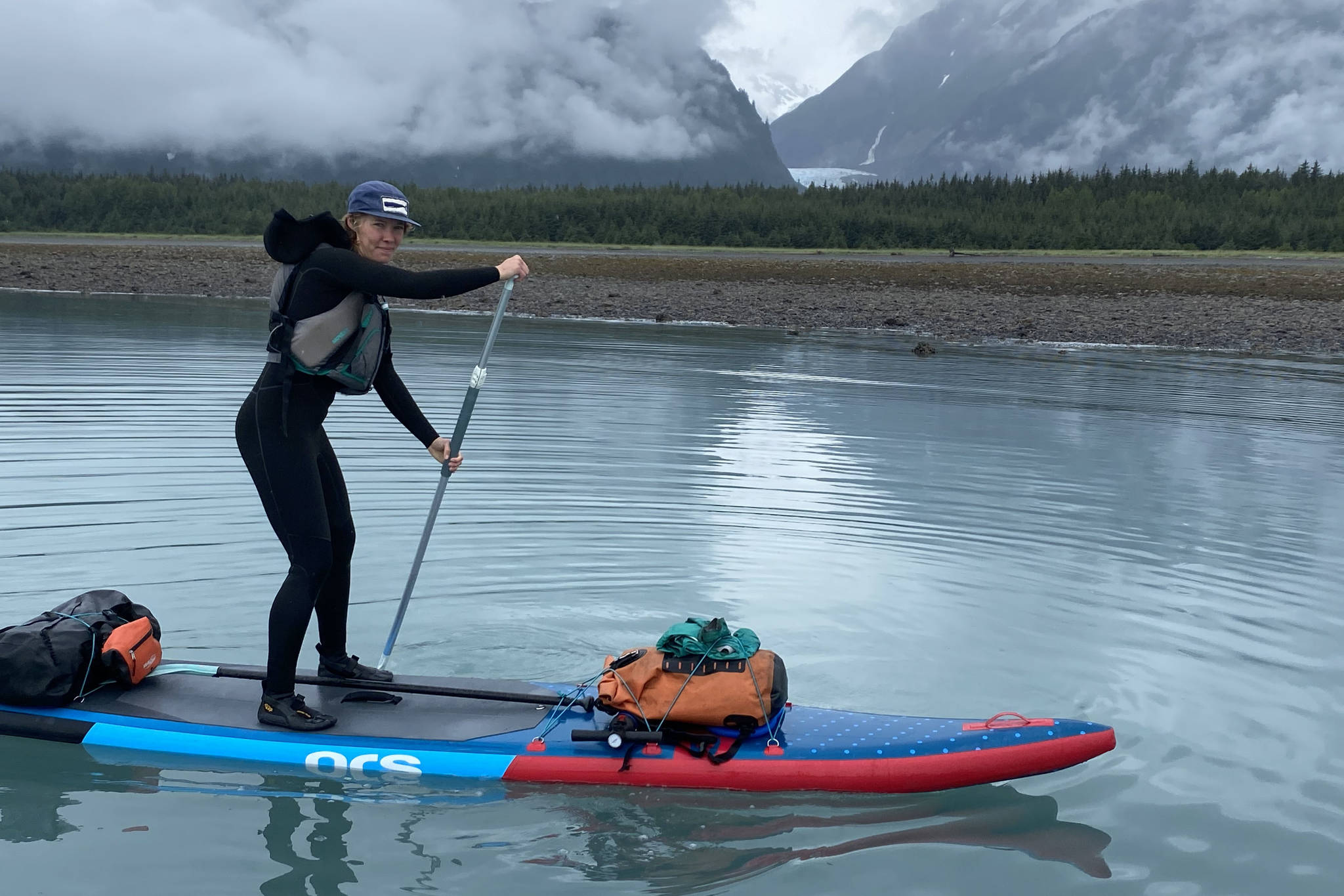 Kaitlyn Tolin, pictured, paddled with partner Amanda Painter from Juneau to Haines over three days in early July. They said they were inspired by friends who had made similar paddleboard trips. (Courtesy photo | Kaitlyn Tolin)