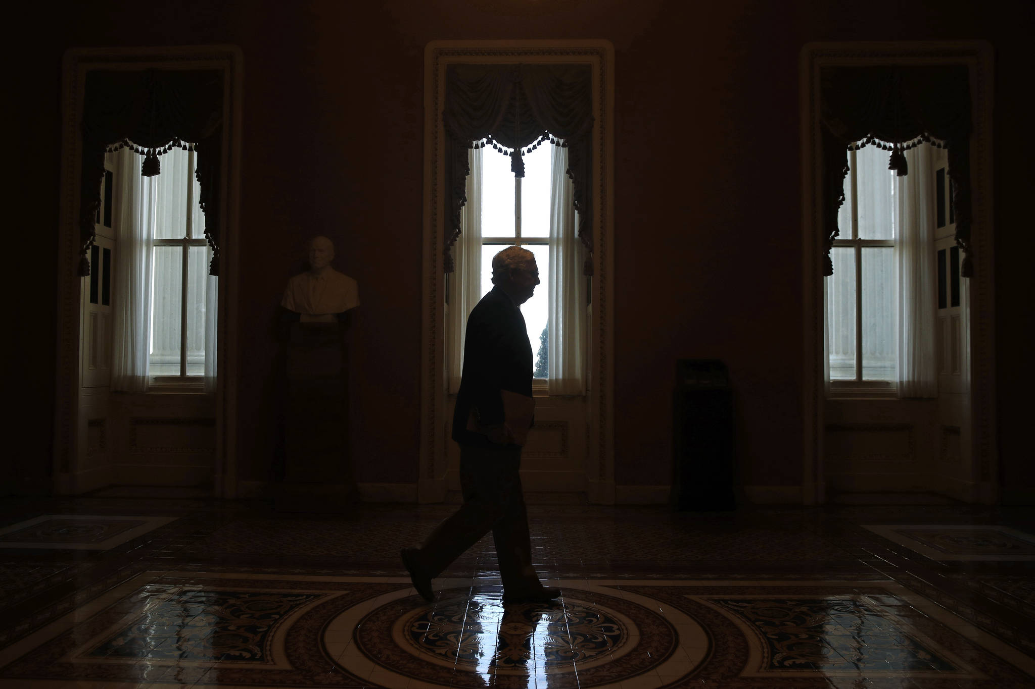 In this April 2020 photo Senate Majority Leader Mitch McConnell of Kentucky, walks to the Senate chamber on Capitol Hill in Washington. Its come to this for Republicans straining to defend their Senate majority in Novembers elections: Theyre air-dropping millions of dollars into races in Alabama, Kentucky and other red states where Donald Trump coasted during his 2016 presidential election triumph. (AP Photo/Patrick Semansky, File)