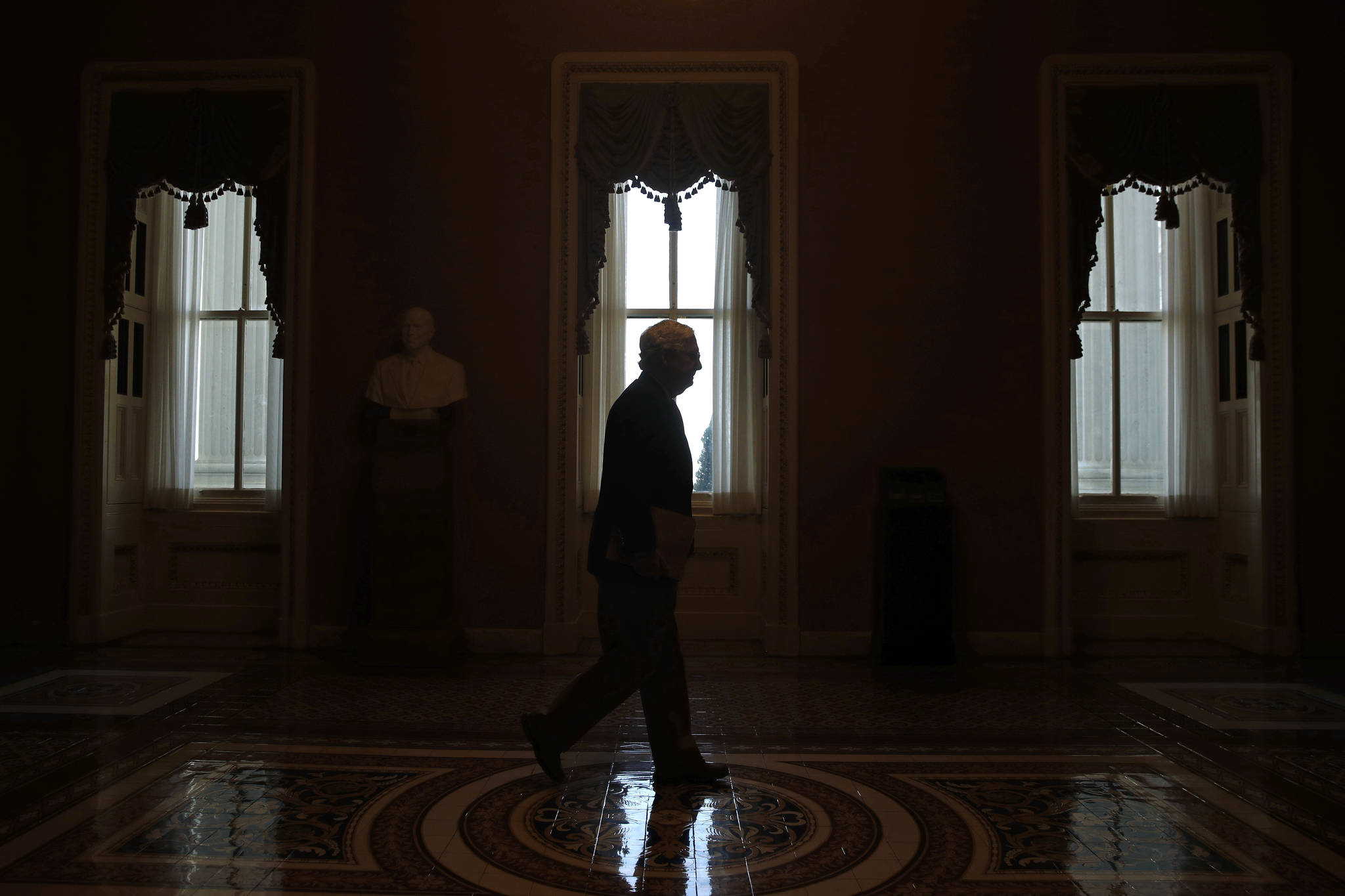 In this April 2020 photo Senate Majority Leader Mitch McConnell of Kentucky, walks to the Senate chamber on Capitol Hill in Washington. It’s come to this for Republicans straining to defend their Senate majority in November’s elections: They’re air-dropping millions of dollars into races in Alabama, Kentucky and other red states where Donald Trump coasted during his 2016 presidential election triumph. (AP Photo/Patrick Semansky, File)