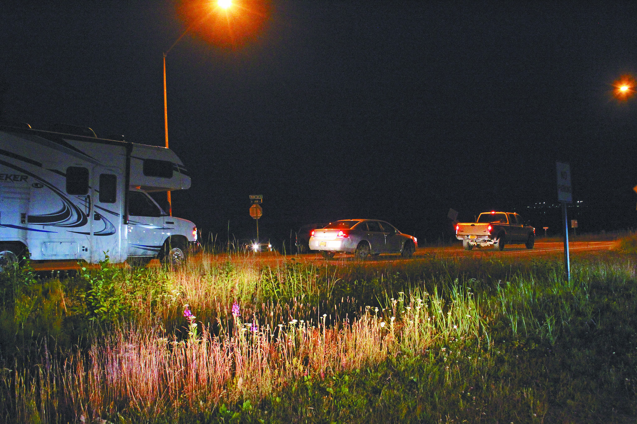Vehicles are stopped and prevented from entering the Homer Spit on Wednesday, July 23, 2020 in Homer, Alaska. A tsunami warning was put into effect for Kachemak Bay and other areas of Alaska following a 7.8 magnitude earthquake off the Aleutian Chain on Tuesday night. Those in the inundation zone in Homer were asked to evacuate. (Photo by Megan Pacer/Homer News)