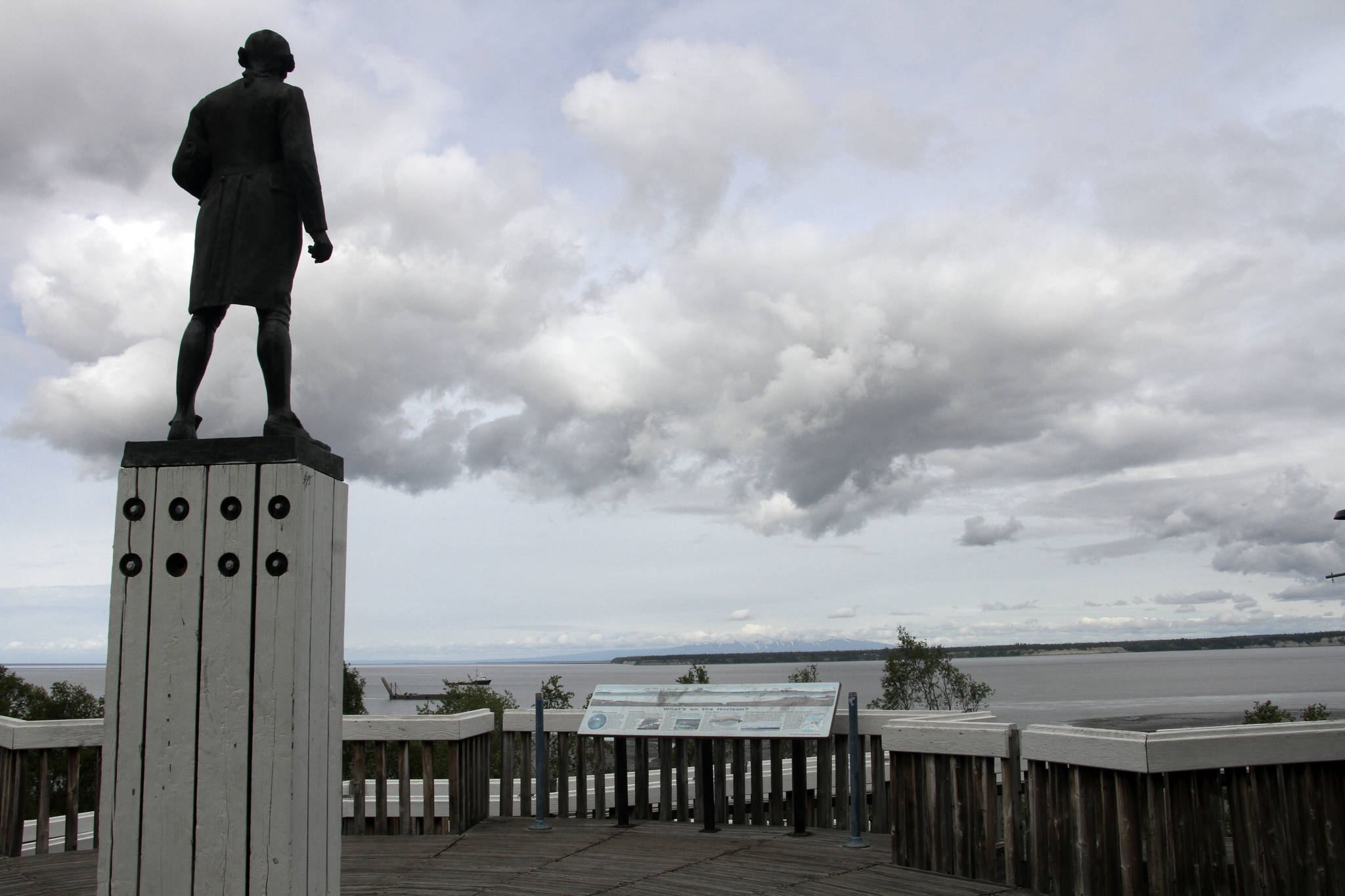 The Captain James Cook statue facing the inlet that bears his name and fronts Alaska’s largest city in downtown Anchorage is seen on June 23, 2020. Far away from Confederate memorials, Alaska residents have joined the movement to eliminate statues of colonialists accused of abusing and exploiting Indigenous people. The effort has already resulted in a statue of Russian America colonialist Alexander Baranov being taken out of public view in one city. Others want statutes removed of U.S. Secretary of State and Alaska purchase architect William Seward and Capt. James Cook. (AP Photo/Mark Thiessen)