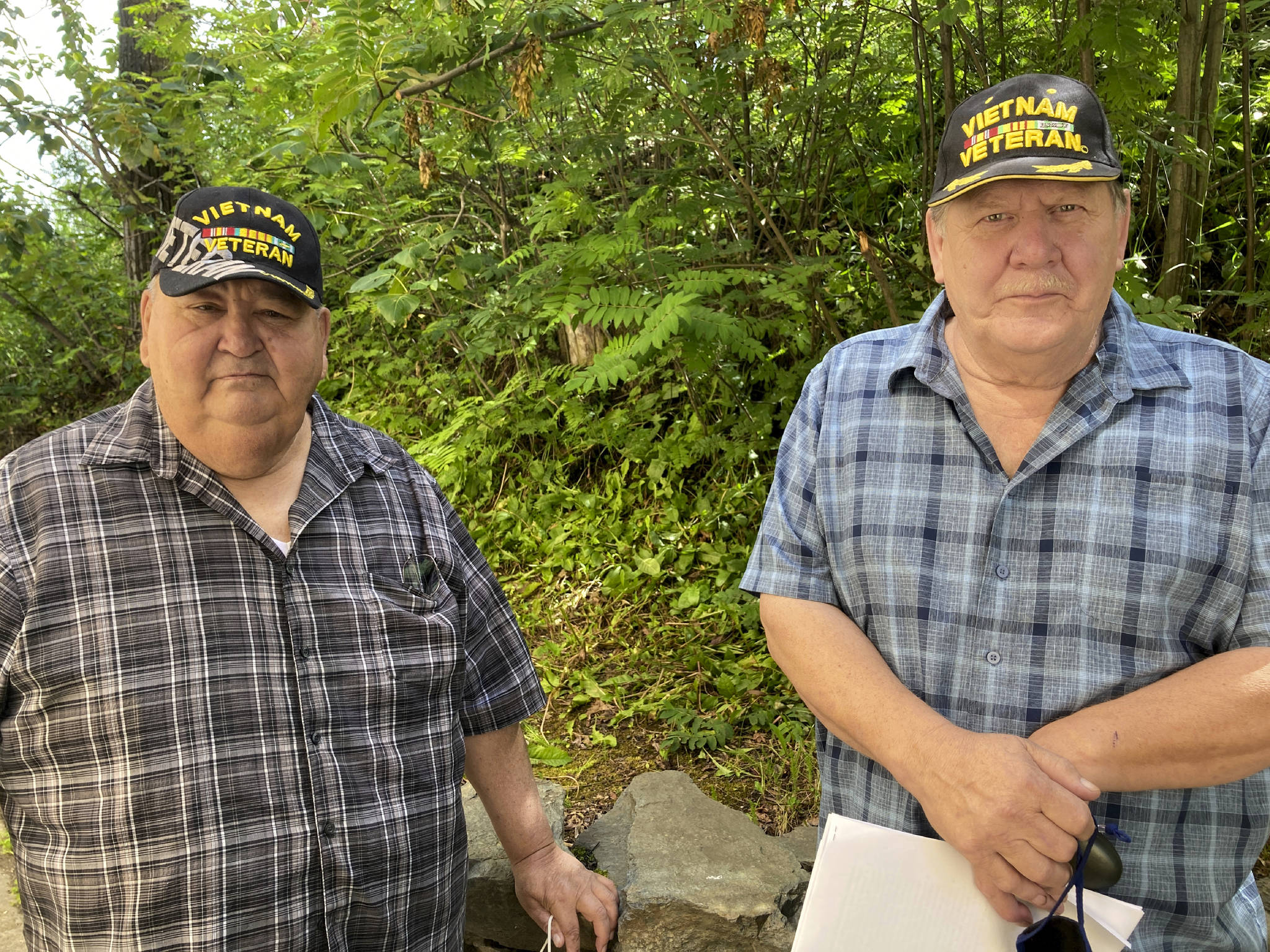 Mark Thiessen / Associated Press                                Chris Kiana, left, and Harold Rudolph pose for a photo July 20 in Anchorage. The two Alaska Native Vietnam veterans are critical of a new government program that will allow Native veterans to apply for land that they might have missed out on in earlier programs because of their service.