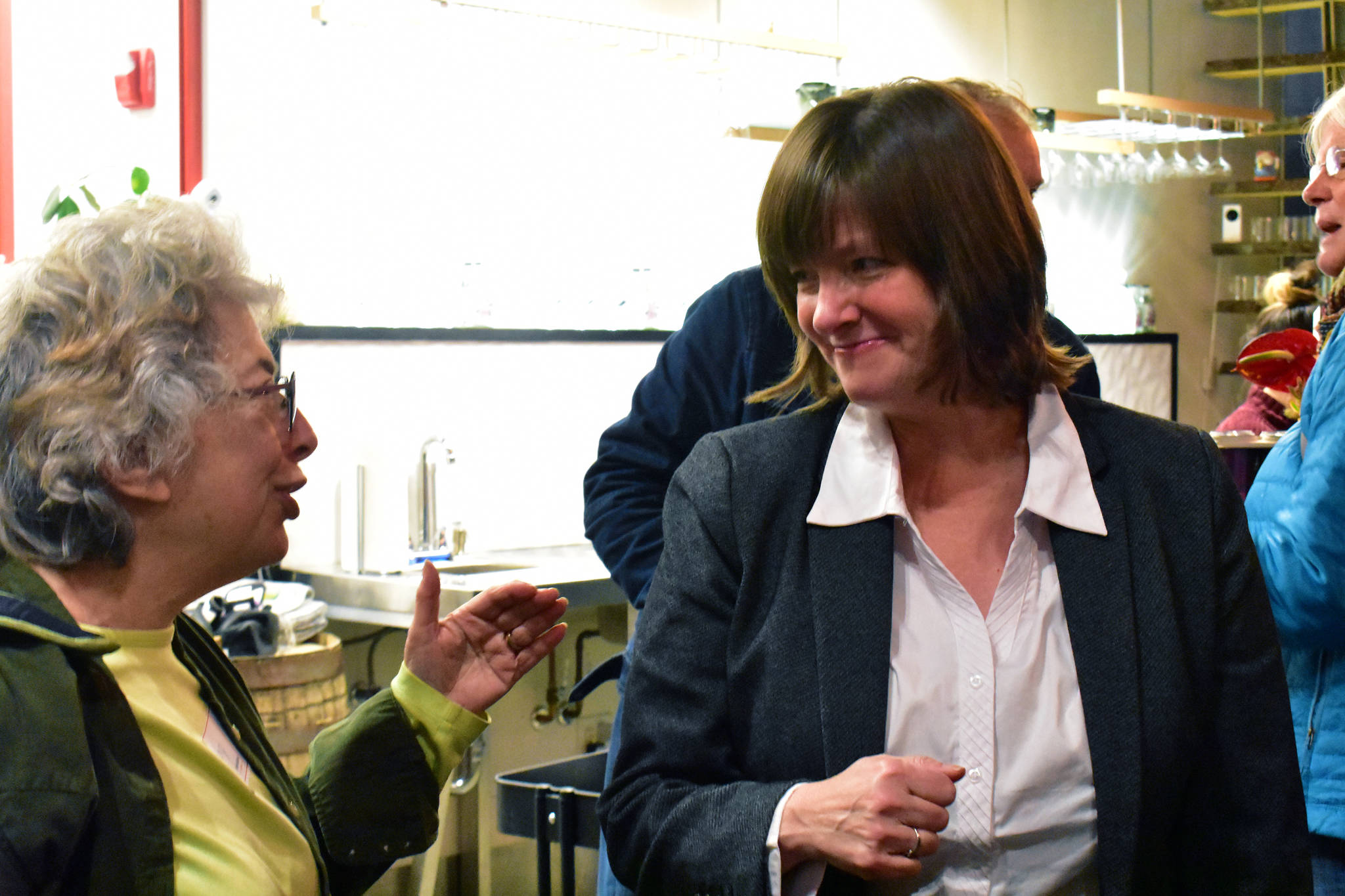 Congressional candidate Alyse Galvin, an Independent seeking to unseat Congressman Don Young, R-Alaska, meets with Juneauites at the Almalga Distillery on Saturday, Nov. 23, 2019. (Peter Segall / Juneau Empire File)