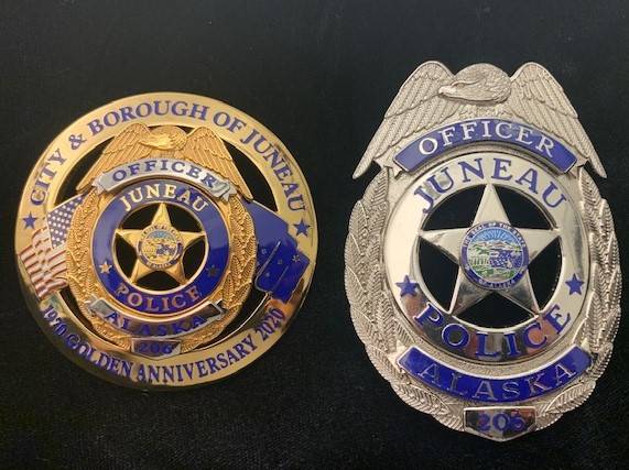 The Juneau Police Department has commemorative badges, left, for officers that requested them for the 50th anniversary of the unification of Juneau and Douglas. (Courtesy photo / Juneau Police Department)