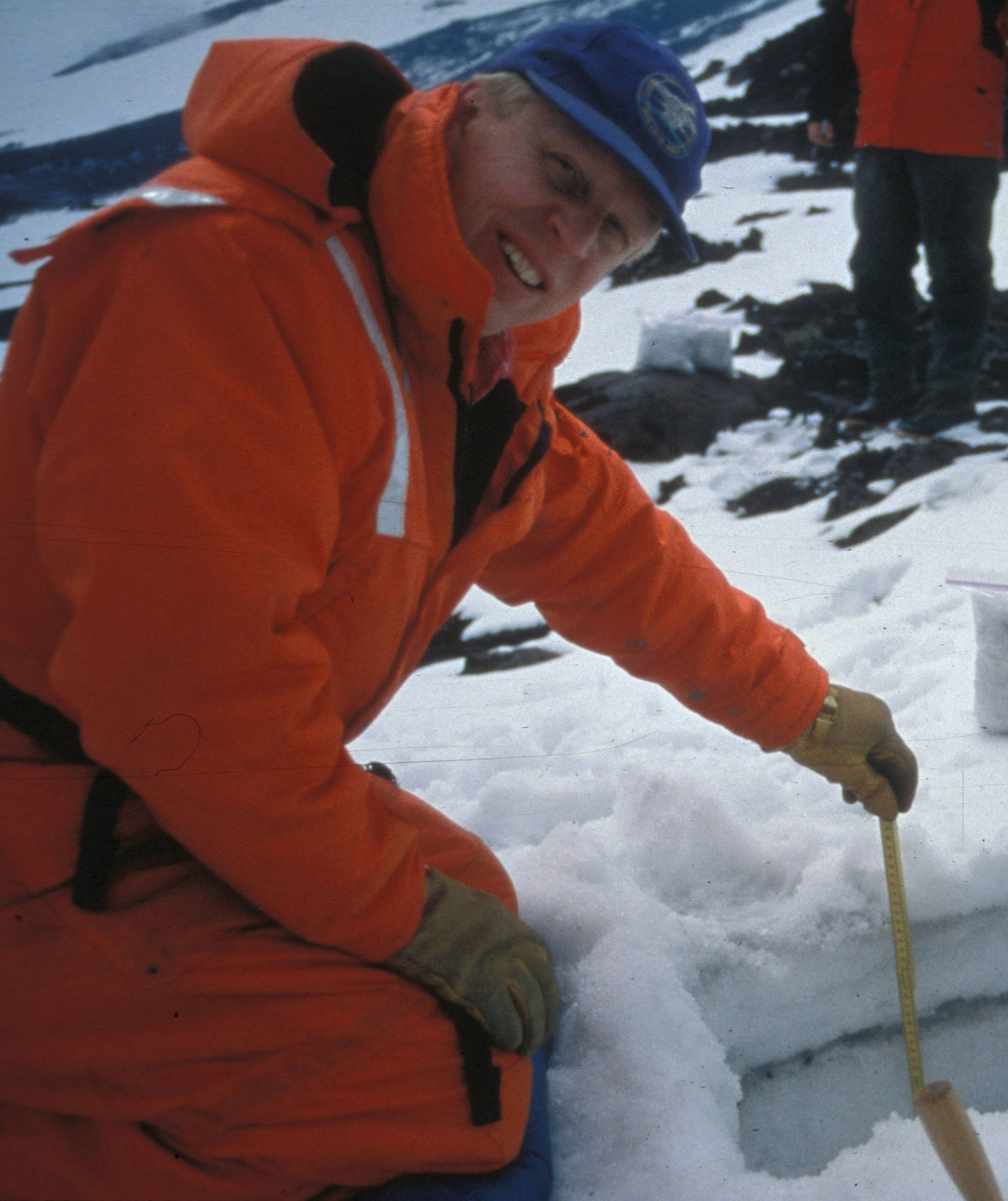 Guy Tytgat measures ash on Shishaldin Volcano after an eruption there in the late 1990s. (Courtesy Photo / Jim Beget, Alaska Volcano Observatory)