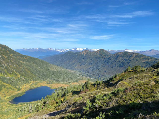 This photo shows Cropley Lake with snow-capped mountains in the distance on Sept. 16, 2020. (Courtesy Photo / Denise Carroll)