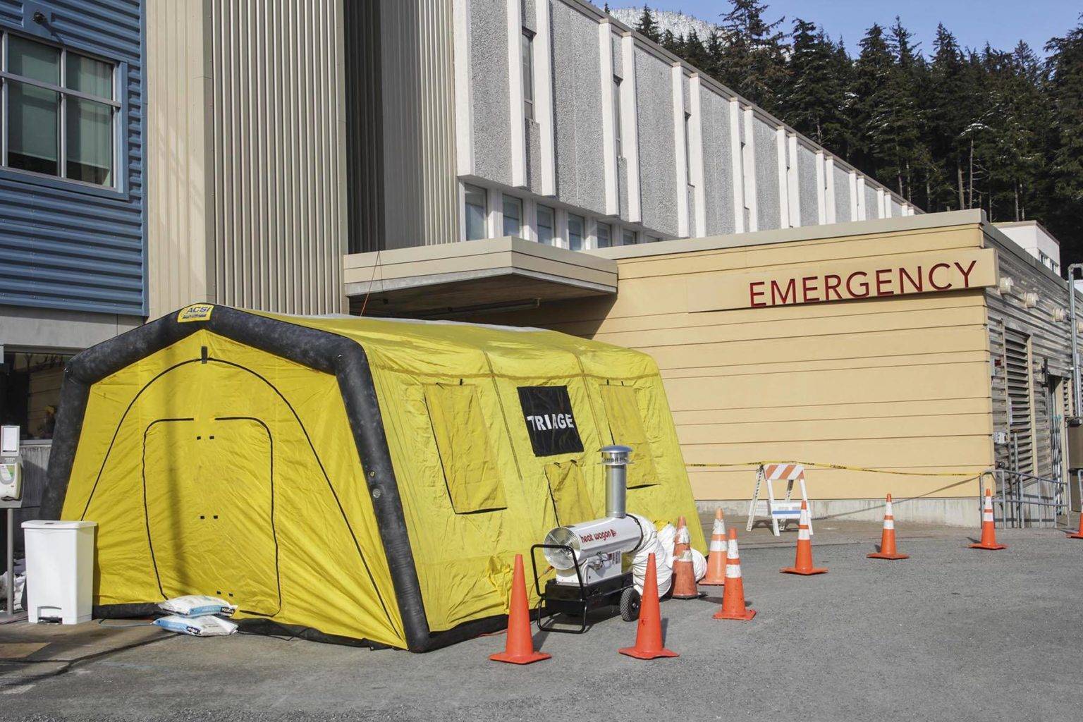 This temporary shelter was set up earlier this year outside Bartlett Regional Hospital was set up for the staff screening people entering the hospital. BRH wants to create a more permanent screening facility at hospital, as it considers renovations for handling COVID-19 in the longterm. (Michael Lockett / Juneau Empire File)