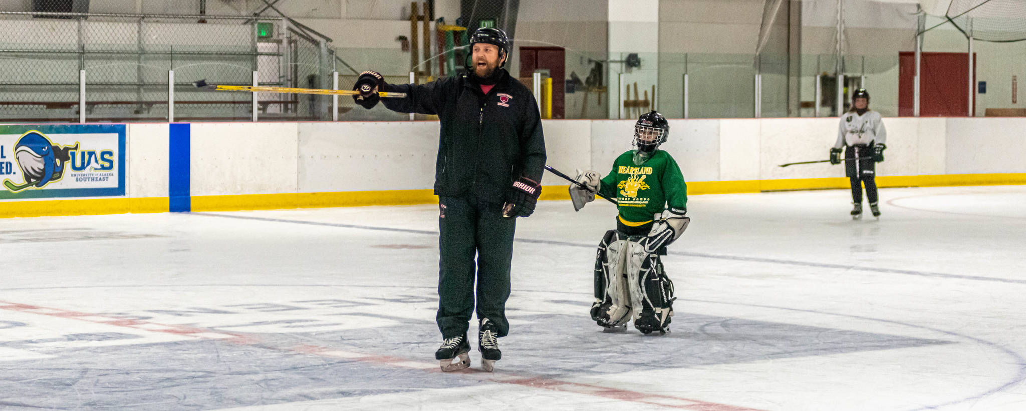 Matt Boline delivers instructions for an upcoming drill during a recent workout with players in the 12-and-under group workout at Treadwell Ice Arena. (Courtesy Photo / Steve Quinn)
