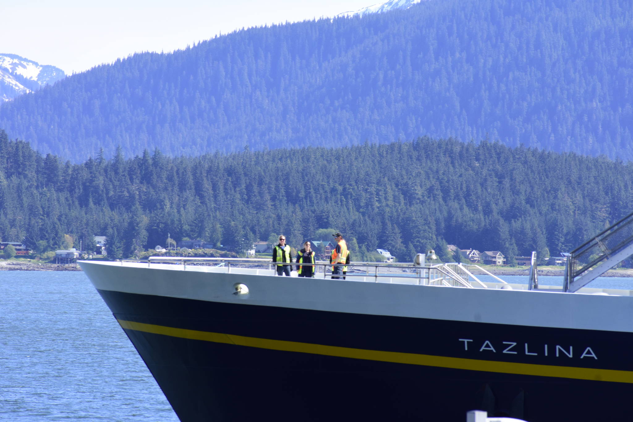 Peter Segall / Juneau Empire file                                Crew members on the Tazlina standby as the vessel docks at the Auke Bay Ferry Terminal on May 16.