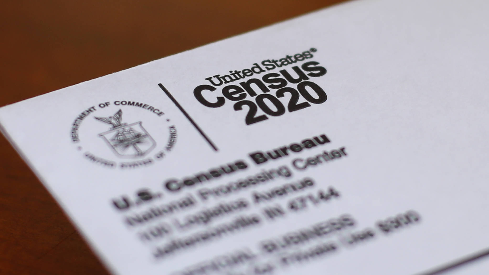This photo shows an envelope containing a 2020 census letter mailed to a U.S. resident in Detroit. The U.S. Census Bureau has spent much of the past year defending itself against allegations that its duties have been overtaken by politics. With a failed attempt by the Trump administration to add a citizenship question, the hiring of three political appointees with limited experience to top positions, a sped-up schedule and a directive from President Donald Trump to exclude undocumented residents from the process of redrawing congressional districts, the 2020 census has descended into a high-stakes partisan battle. (AP Photo / Paul Sancya)