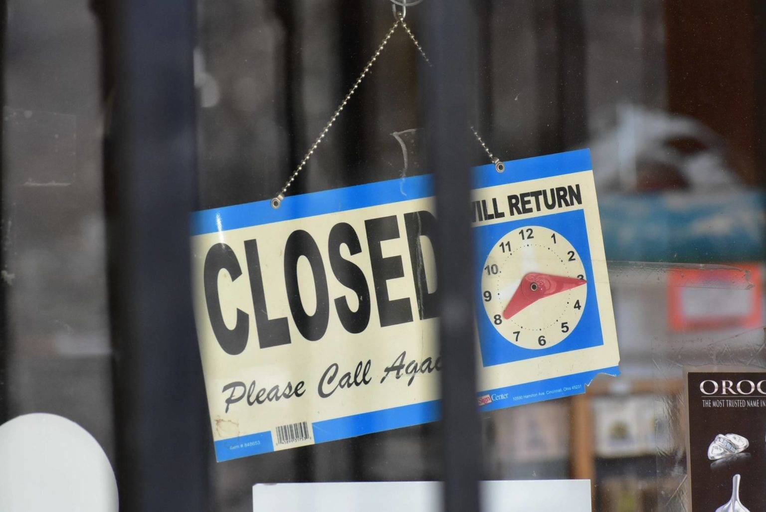 A sign in the window of a business on South Franklin Street in downtown Juneau on April 14, 2020. State officials say additional employments payments will be sent out soon. (Peter Segall / Juneau Empire File)