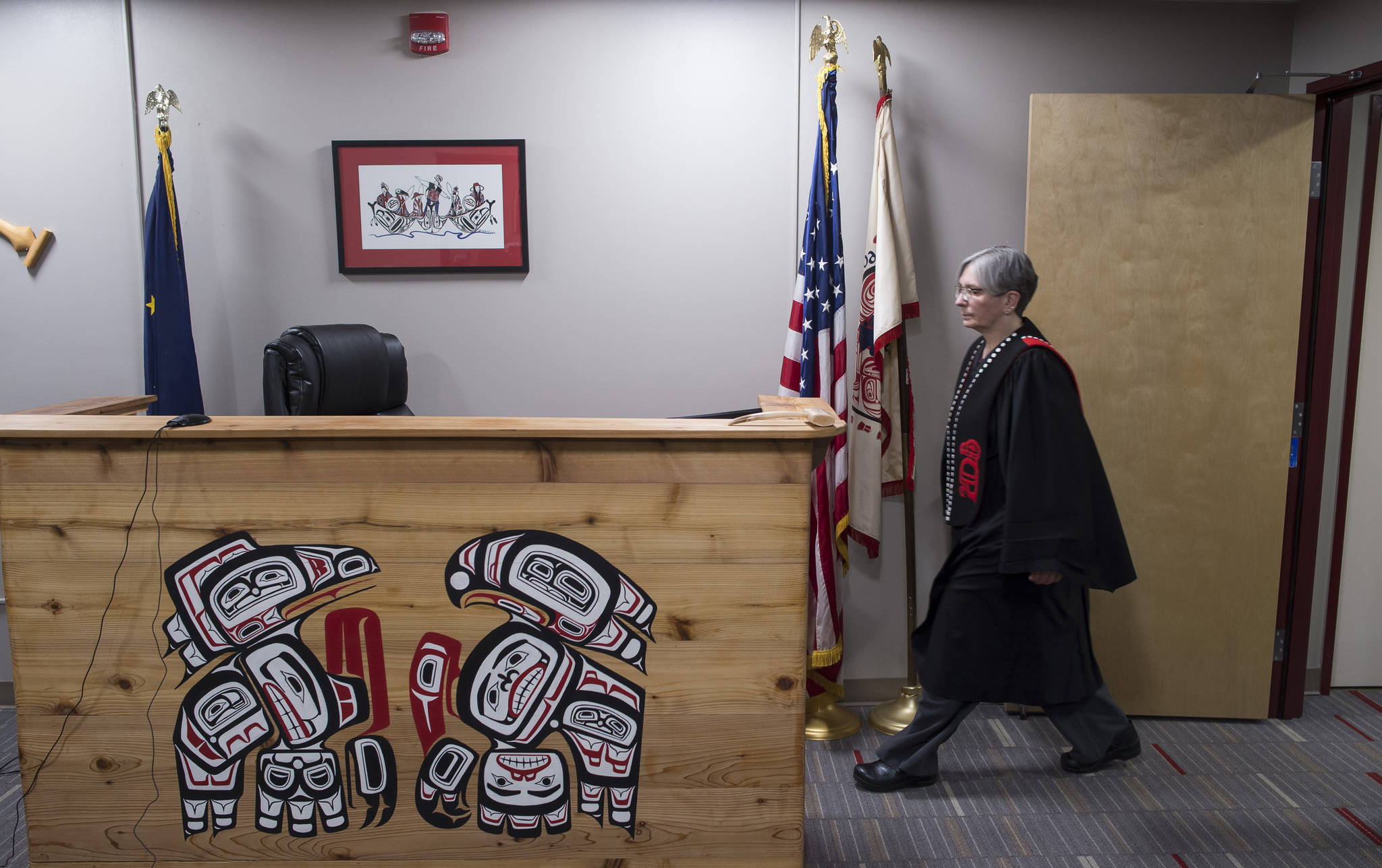 Judge Deb OGara enters the Central Council of Tlingit and Haida Indian Tribes of Alaskas Tribal Court on Wednesday, March 14, 2018. Funding from federal grants will allow Tlingit and Haida to expand its court. (Michael Penn / Juneau Empire File)