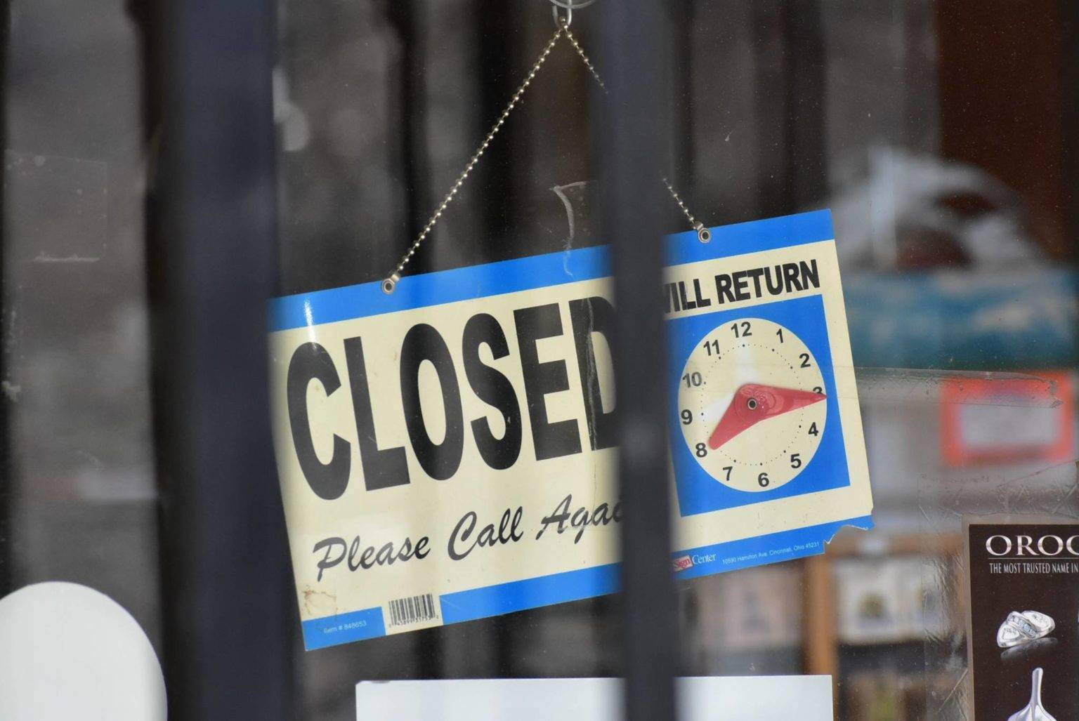 A sign in the window of a business on South Franklin Street in downtown Juneau on April 14, 2020. State officials say additional employments payments will be sent out next week. (Peter Segall / Juneau Empire File)
