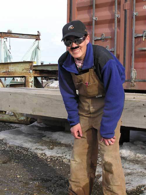 Biologist Stacia Backensto dons a disguise to fool ravens on Alaskas North Slope. (Courtesy Photo / Ned Rozell)