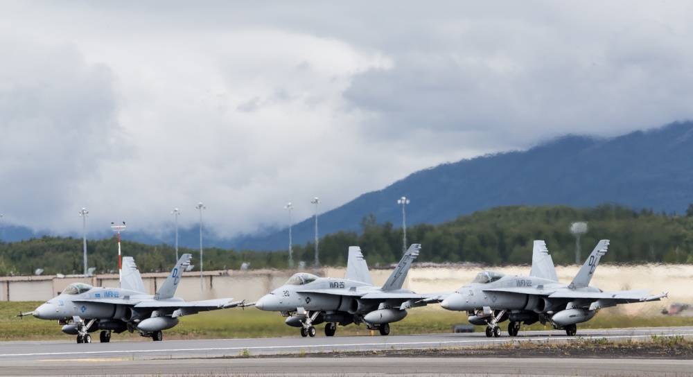 U.S. Marine Corps F/A-18C Hornets assigned to Marine Fighter Attack Squadron 251 prepare to take-off from the flightline during Red Flag-Alaska 17-2 on Joint Base Elmendorf-Richardson, Alaska, June 20, 2017. (U.S. Marine Corps / Lance Cpl. Koby I. Saunders)