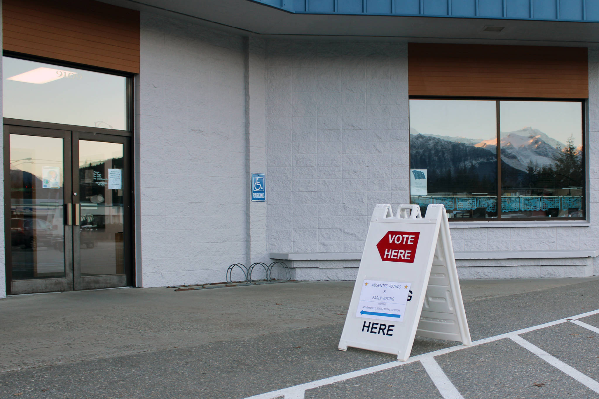 A sign outside the Mendenhall Mall directs voters to an early, in-person polling location. (Ben Hohenstatt / Juneau Empire)