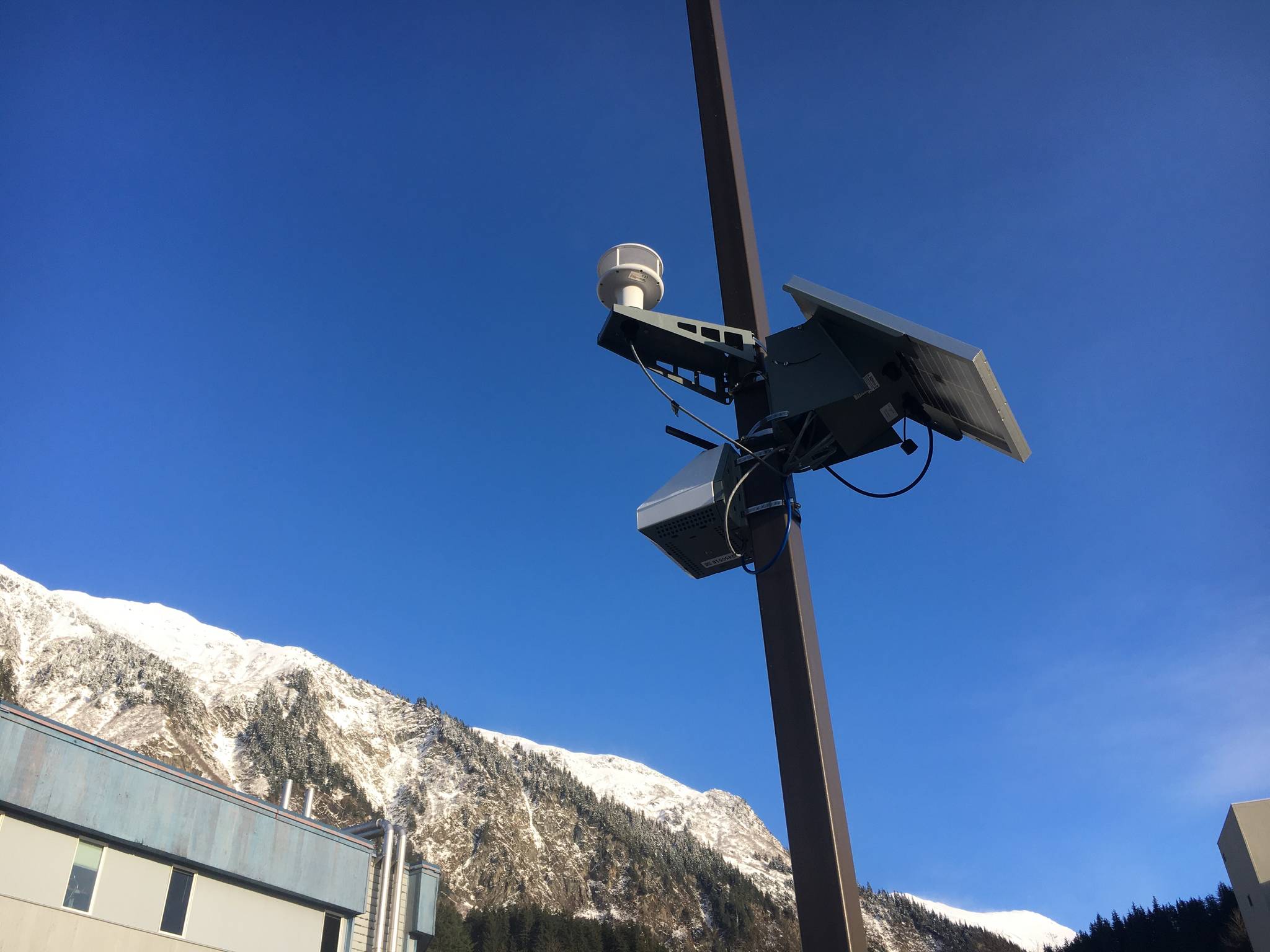 The Alaska Department of Environmental Conservation has installed three air quality sensors, like the one pictured here off of Whittier Avenue on Nov. 16, 2020, around Juneau to mention the effects of cruise ships on air quality, following an inconclusive 2019 study. (Michael S. Lockett / Juneau Empire)