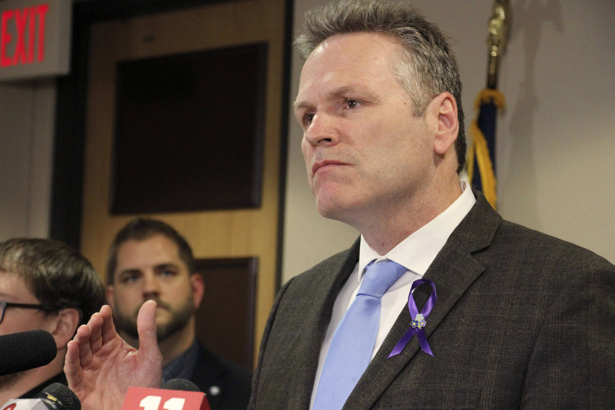 Gov. Mike Dunleavy speaks during a news conference in Anchorage in March. Dunleavy faces criticism for his handling of COVID-19, from those who think hes not doing enough to address rising case counts to those who think hes been overreaching. (AP Photo / Mark Thiessen)