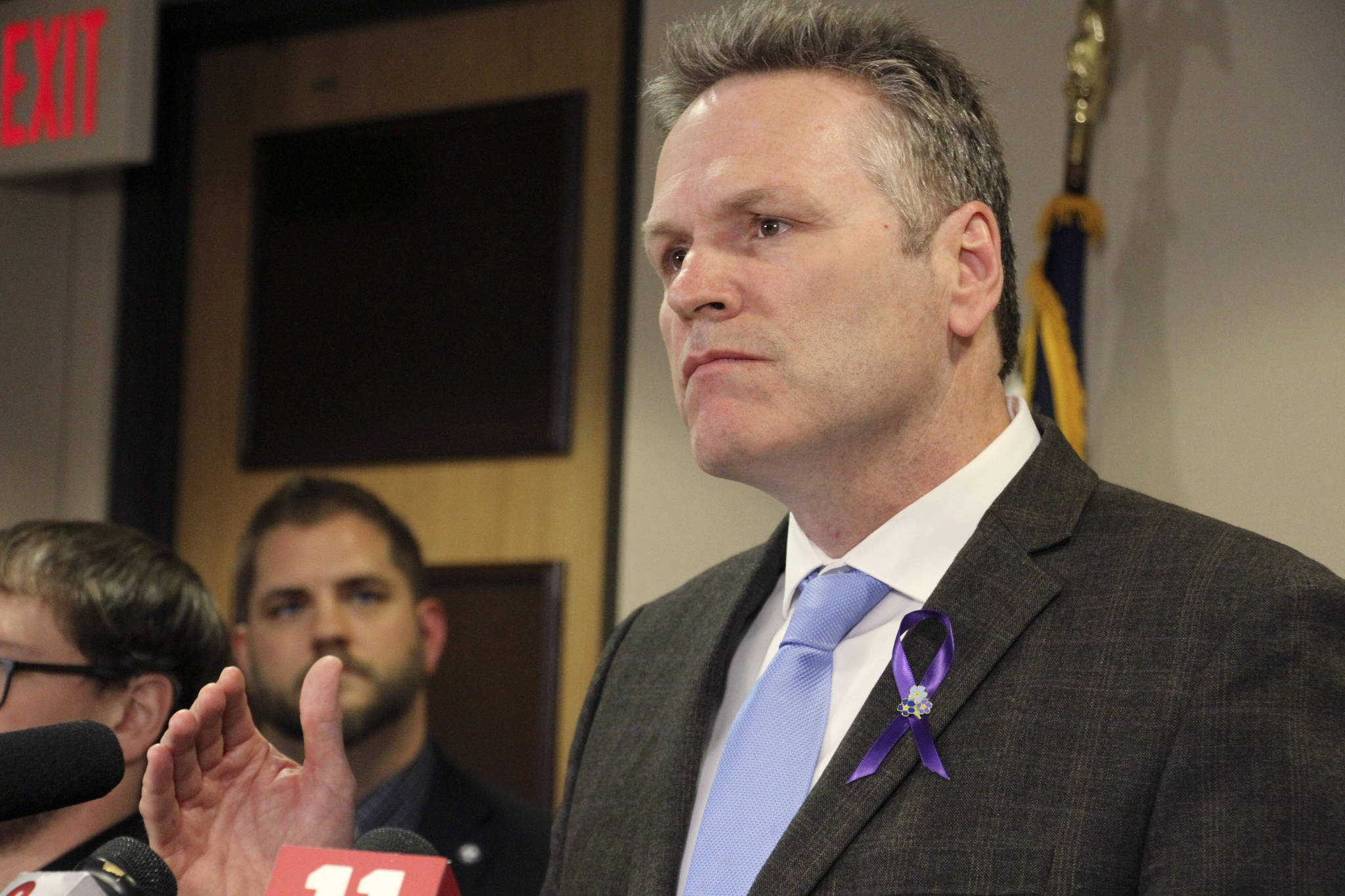 Gov. Mike Dunleavy speaks during a news conference in Anchorage in March. Dunleavy faces criticism for his handling of COVID-19, from those who think he’s not doing enough to address rising case counts to those who think he’s been overreaching. (AP Photo / Mark Thiessen)