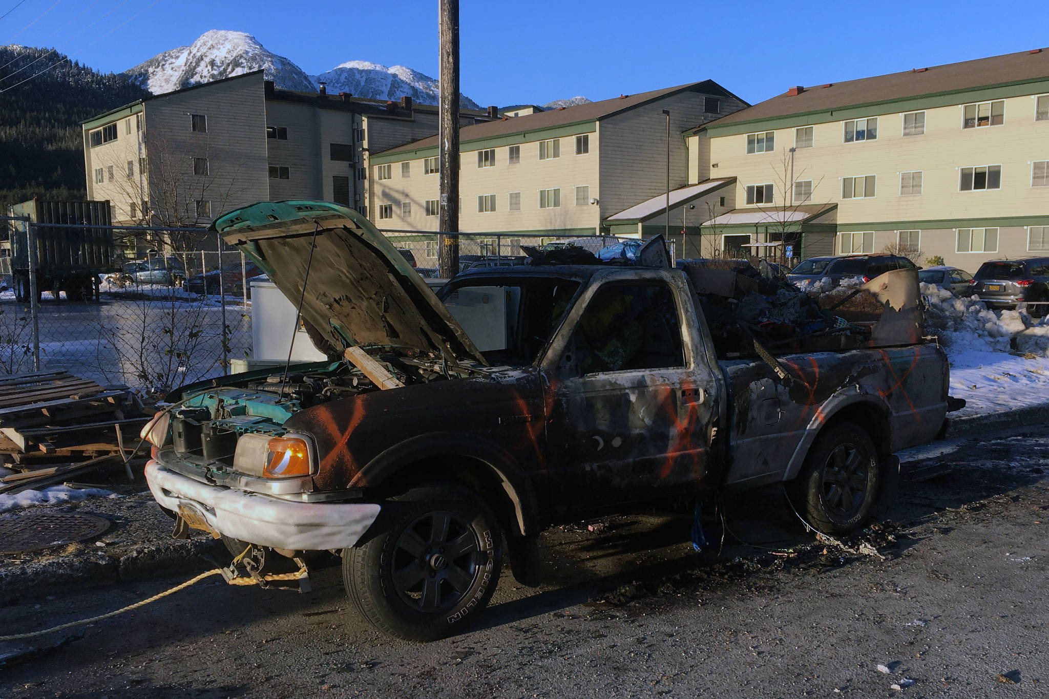 Capital City Fire/Rescue responded to a call at approximately 10 p.m. on Nov. 16, 2020 to a vehicle fire downtown. The vehicle, shown here the next morning, was located on F Street. (Michael S. Lockett / Juneau Empire)
