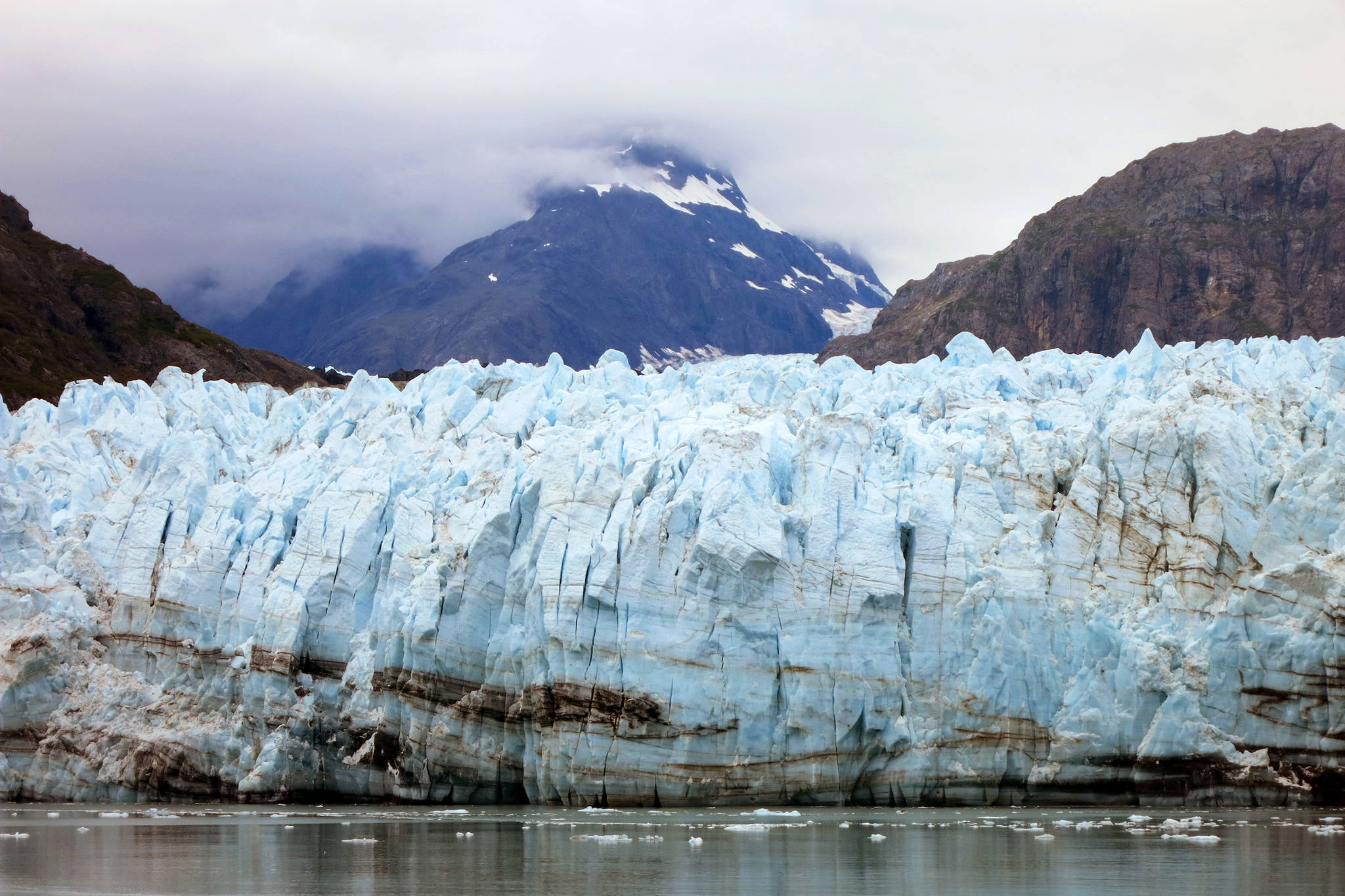 This July 2014 photo shows Margerie Glacier, one of many glaciers that make up Alaska's Glacier Bay National Park. U.S. officials on Friday, Nov. 20, 2020, released details on proposed land conservation purchases for the coming year amid bipartisan objection to restrictions on how the government's money can be spent. (AP Photo / Kathy Matheson)