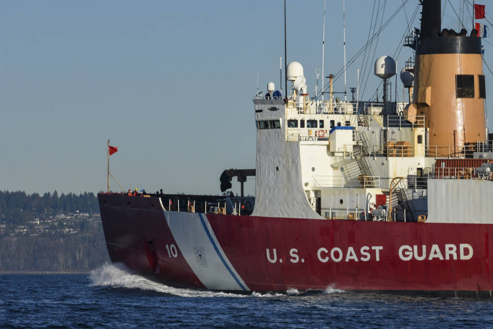U.S. Coast Guard Cutter Polar Star (WAGB-10) transits the waters of Puget Sound near Seattle on Dec. 4, 2020. The Alaska Navy League is holding a drive for the servicemembers aboard as they’re deployed during the winter holidays. (Petty Officer 2nd Class Steve Strohmaier / U.S. Coast Guard)