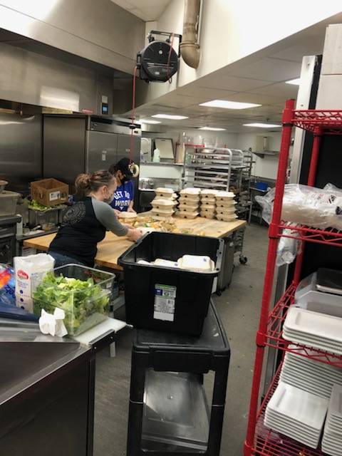 Workers at Heritage Coffee Roasting Company prepare hundreds of meals for Haines residents and emergency relief workers following landslides that destroyed many homes and killed two.
Courtesy Photo
Kirk Stagg