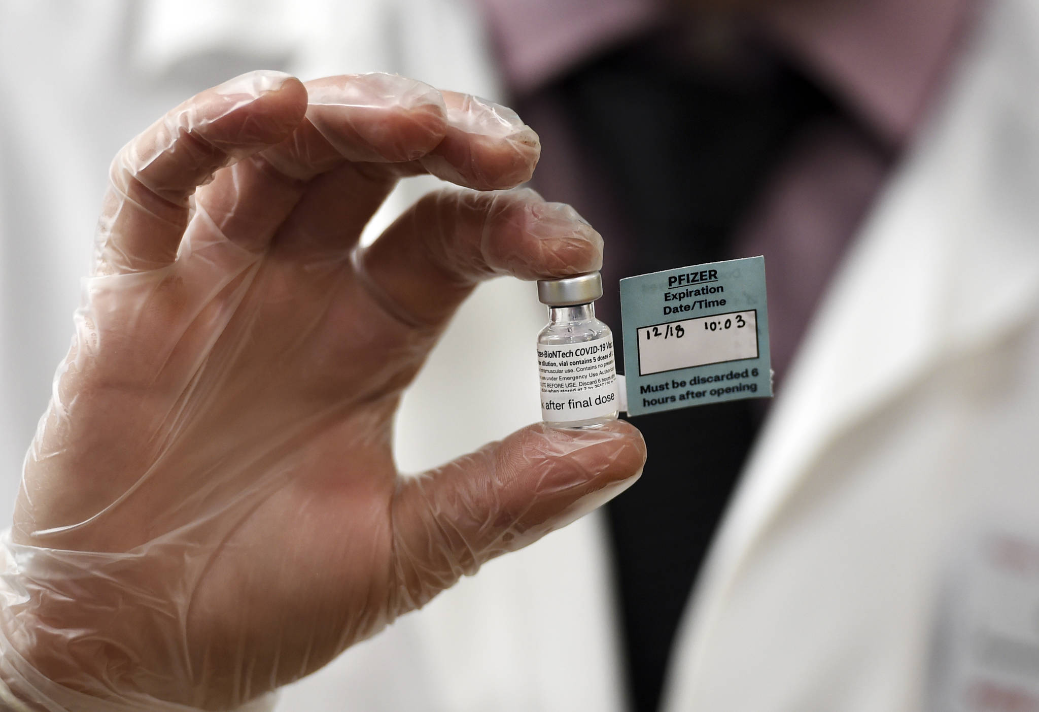 A vial of the Pfizer vaccine used at The Reservoir nursing facility, is shown, Friday, Dec. 18, 2020, in West Hartford, Conn. (AP Photo / Stephen Dunn,Pool)