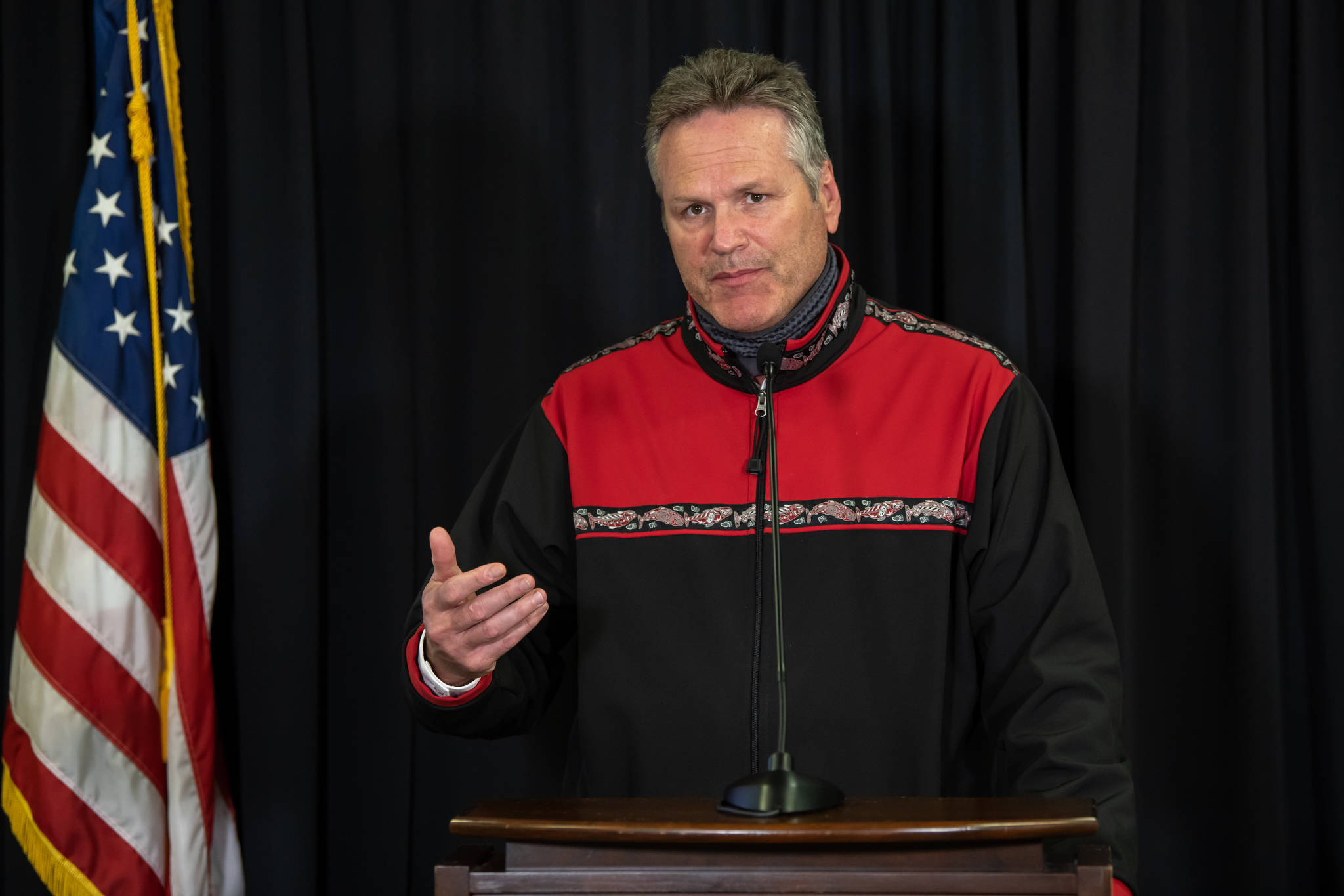 Gov. Mike Dunleavy speaks during an August news conference. On Tuesday, Dunleavy proposed reorganizing the state’s largest department, the Department of Health and Social Services, into two smaller departments. (Courtesy Photo / Office of Gov. Mike Dunleavy)
