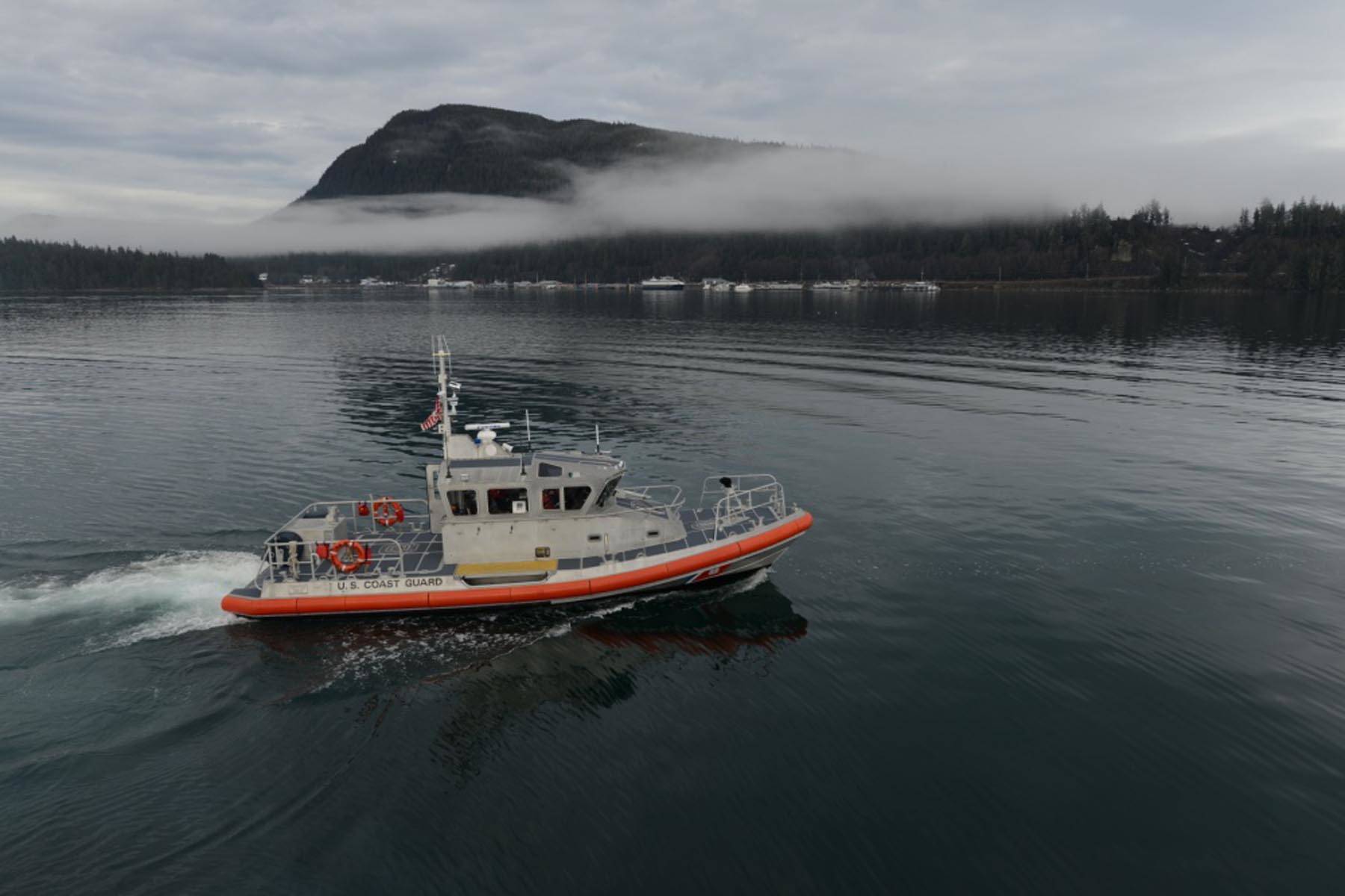 A Coast Guard Station Juneau 45-foot Response Boat-Medium patrols Auke Bay during an exercise in 2018. A response boat similar to the one in the photo was used to rescue two hunters on Admiralty Island on Thursday. (Lt. Brian Dykens / U.S. Coast Guard)