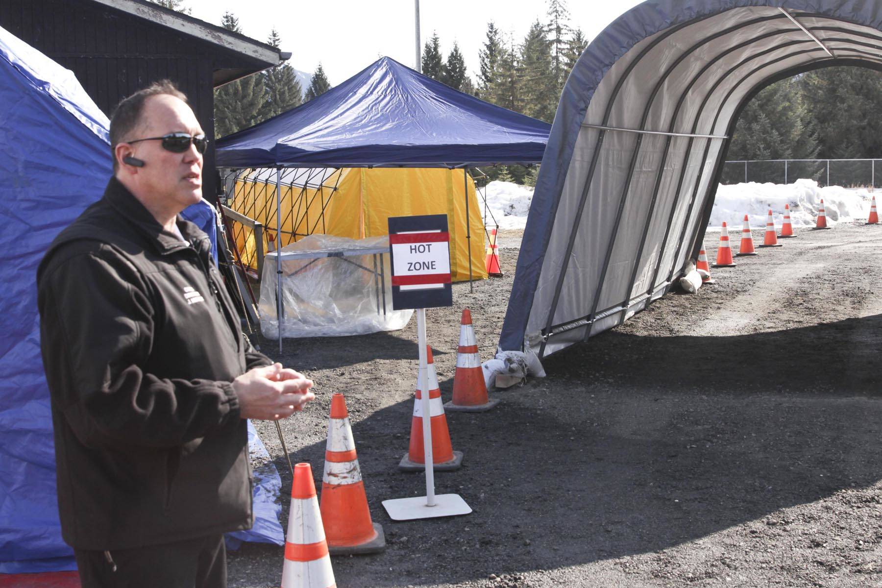 Capital City Fire/Rescue Community Community Assistance Response and Emergency Services manager Joe Mischler talks about the appointment-based drive-thru testing site located at the Hagevig Regional Fire Training Center for possible coronavirus patients, March 24, 2020. (Michael S. Lockett / Juneau Empire File)