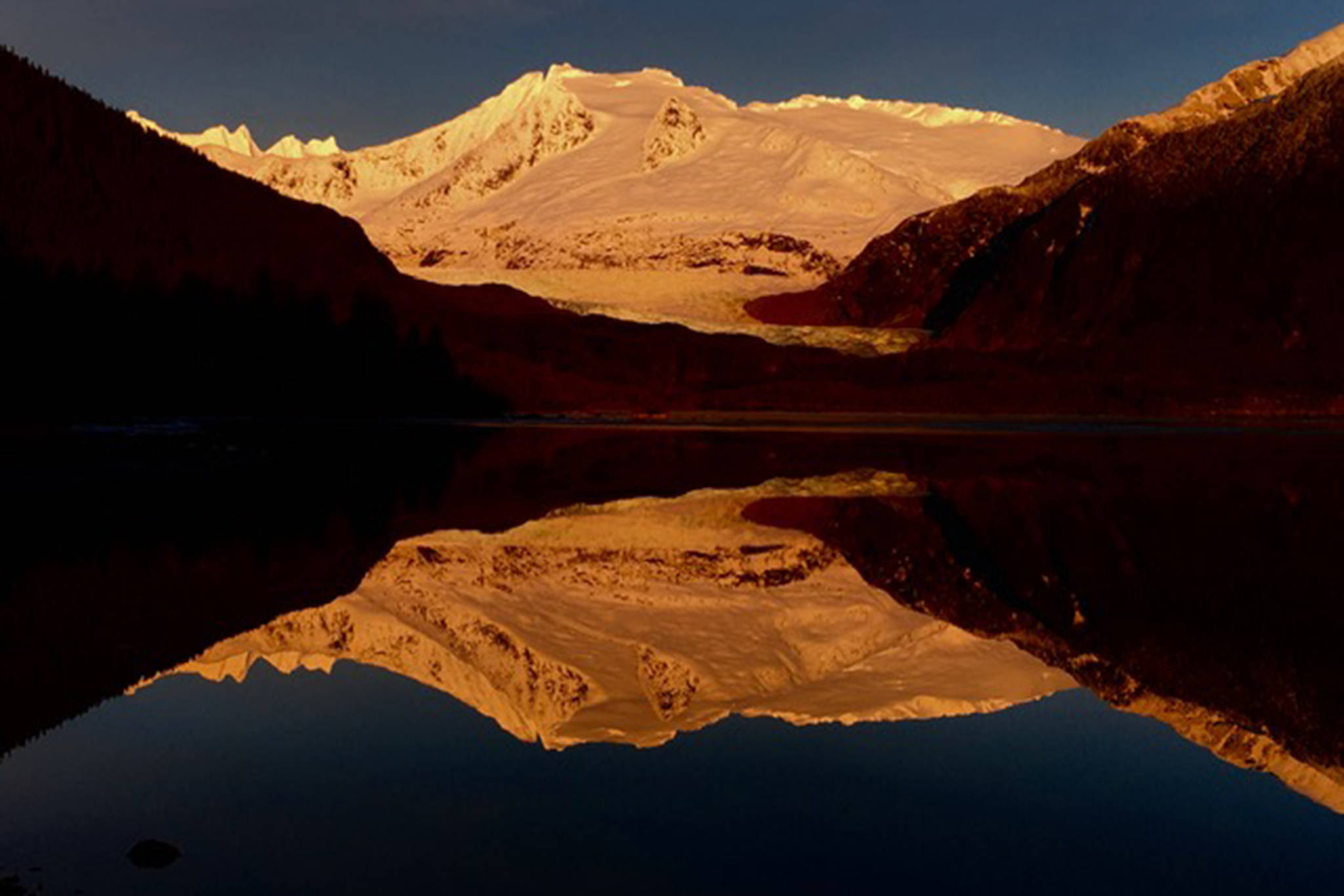 This Dec. 9 photo shows a gold-tinged reflection in Mendenhall Lake. (Courtesy Photo / Linda Buckley)