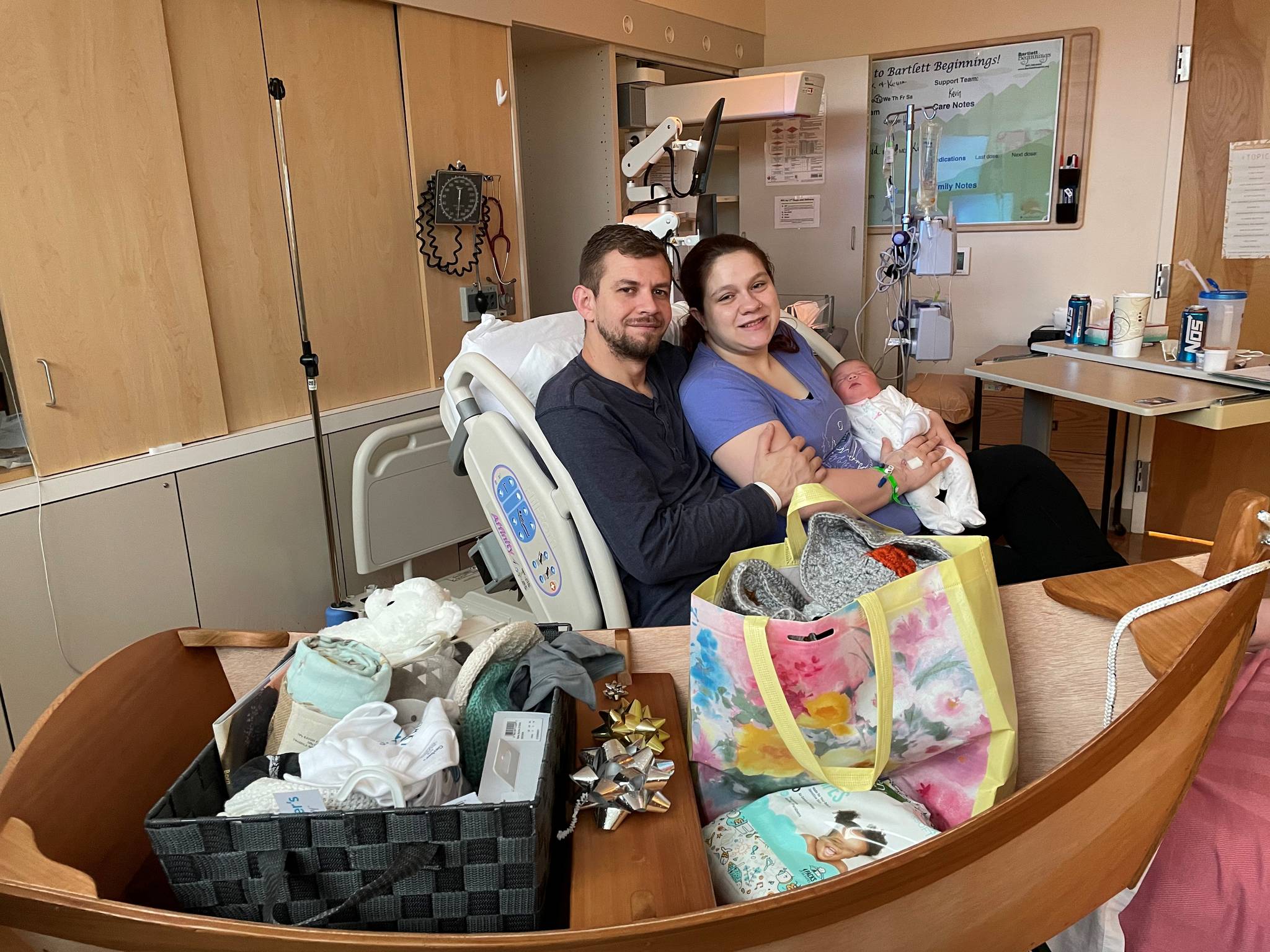 Kevin McCallister and Alexus Forehand smile with their recently born daughter, Madelynn Rose. The McCallisters of Skagway are the parents of the first baby born at Bartlett Regional Hospital in 2021. (Courtesy Photo / BRH)