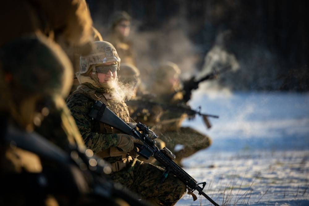 Cpl. Jose M. Barragan, a bulk fuel specialist with 7th Engineer Support Battalion, 1st Marine Logistics Group, prepares to conduct a live-fire and maneuver range in Fort Greely, Alaska, Feb. 11, 2020, prior to exercise Arctic Edge 20. (U.S. Marine Corps / Lance Cpl. Christopher W. England)