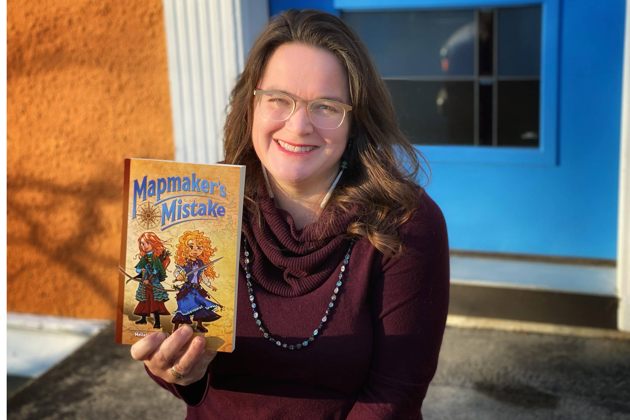 Juneau resident and owner of Rain Coast Data Meilani Schijvens, recently wrote and published a book for readers ages nine to 12. The book takes place in the fictional land of Zanzia, but includes nods to Southeast Alaska and features the talents of local artists. (Courtesy Photo/Sander Schijvens)