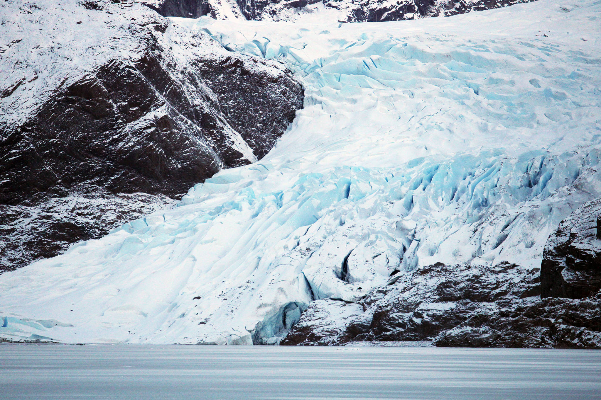 The Mendenhall Glacier is devoid of tourists in this January 2021 photo. (Ben Hohenstatt / Juneau Empire)