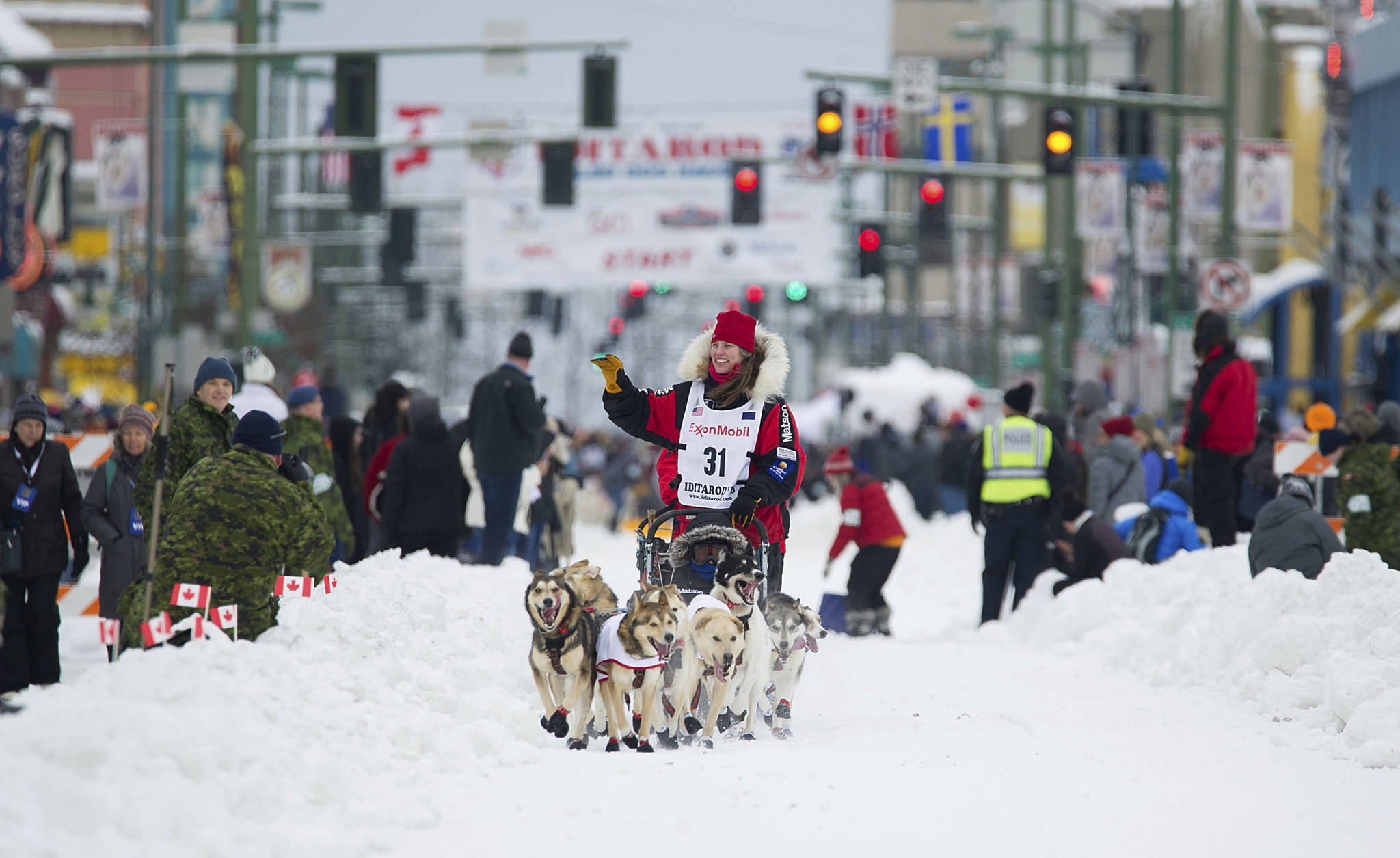 In this March 2018 photo, Aliy Zirkle runs her team during the ceremonial start of the Iditarod Trail Sled Dog Race in Anchorage, Alaska. There has been another dramatic change to the world’s most famous sled dog race this year because of the pandemic, with officials announcing Friday, Feb. 5, 2021, that the ceremonial start has been canceled. (AP Photo / Michael Dinneen)