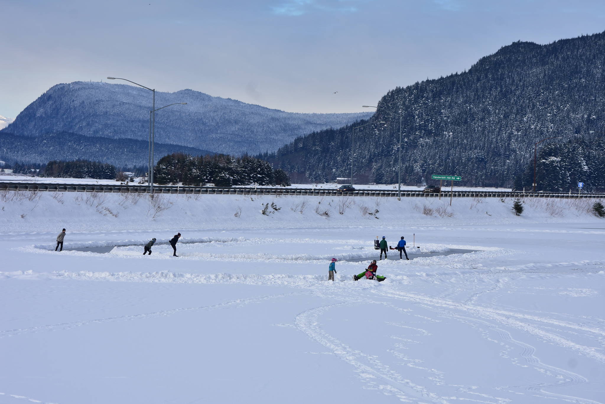 People play on the frozen Twin Lakes on Saturday, Feb. 6. A high pressure system in Canada is sending temperatures through the floor for the next week, according to the National Weather Service. (Peter Segall / Juneau Empire)