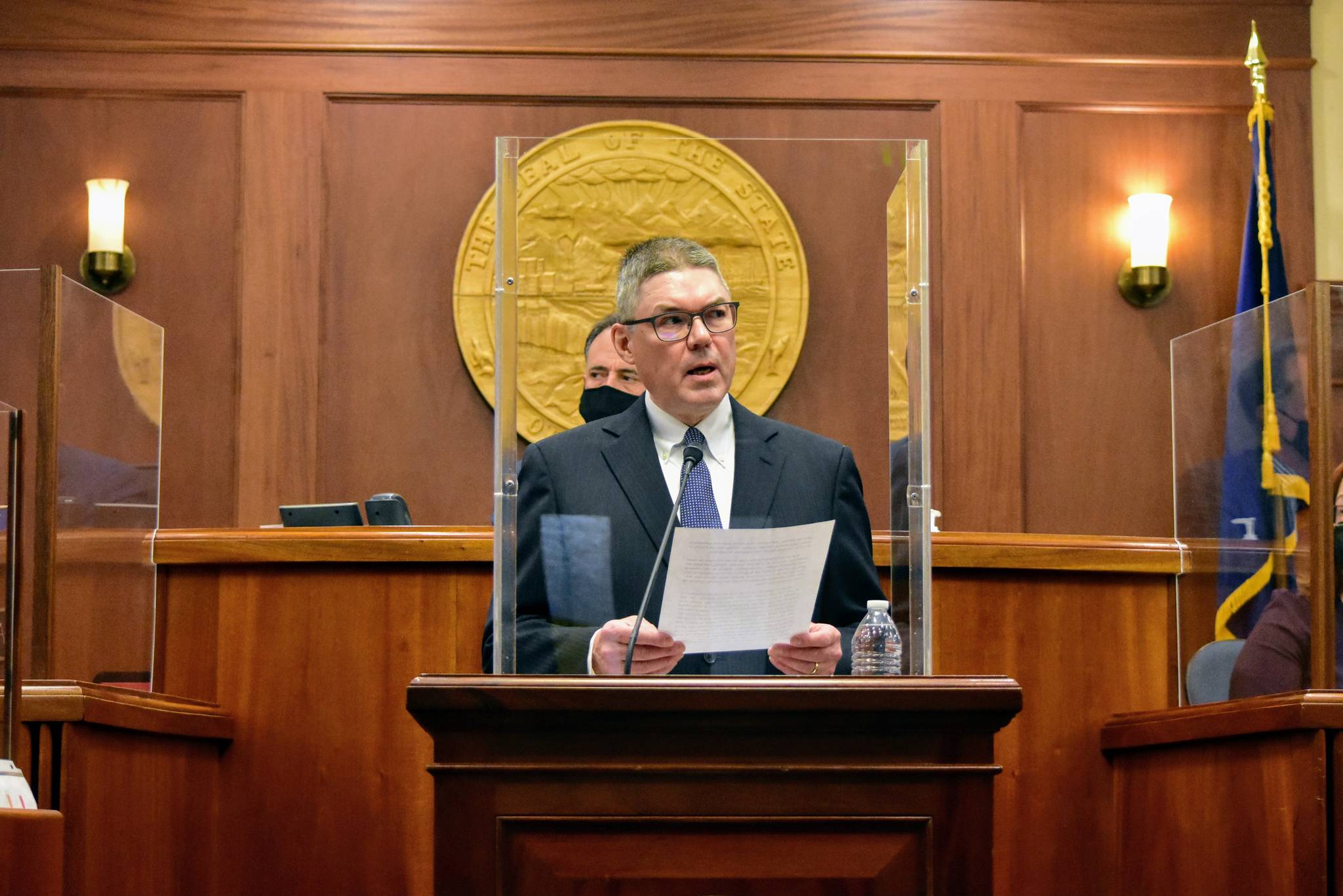 Chief Justice of the Alaska Supreme Court Joel Bolger speaks from behind a plexiglass encased podium to deliver the State of the Judiciary address to state lawmakers on Wednesday, Feb. 17, 2021. Despite complications posed by the pandemic, Bolger said Alaskan courts were still able to deliver services. (Peter Segall / Juneau Empire)