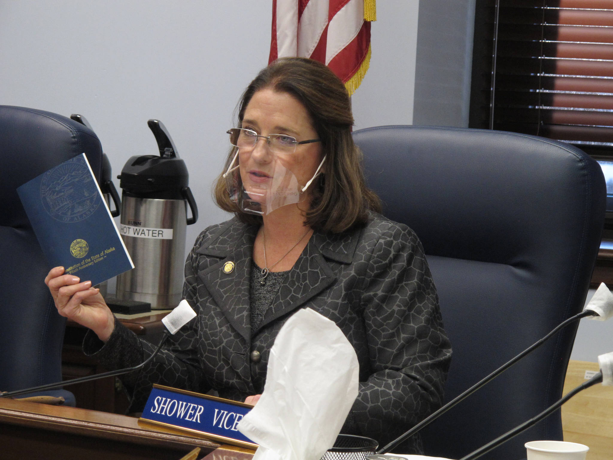 State Sen. Lora Reinbold, R-Eagle River, holds a copy of the Alaska Constitution during a committee hearing on Wednesday, Jan. 27, 2021. Gov. Mike Dunleavy, a Republican, sent Reinbold a letter on Feb. 18, 2021, saying she has used her position to “misrepresent” the state’s COVID-19 response. Reinbold said the letter was “full of baseless accusations and complaints.” (AP Photo / Becky Bohrer)