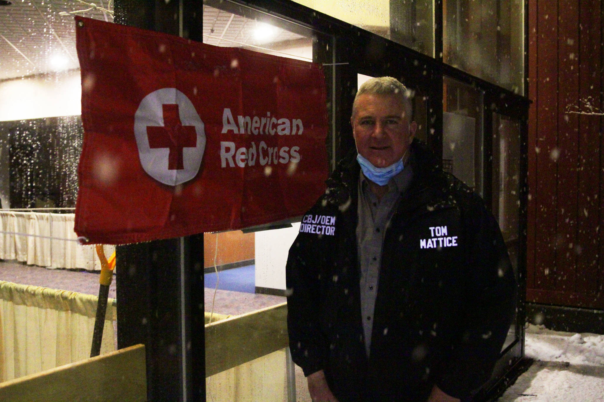 City and Borough of Juneau emergency program manager Tom Mattice stands outside Centennial Hall, appropriated as an evacuation shelter for those in the path of possible avalanches on Feb. 27, 2021. (Michael S. Lockett / Juneau Empire)