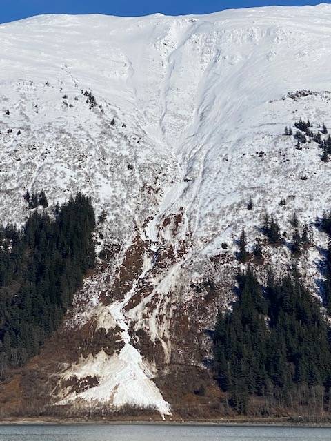 A large avalanche with mud and debris came down on Thane Road during the beginning of March. (Courtesy Photo / Denise Carroll)