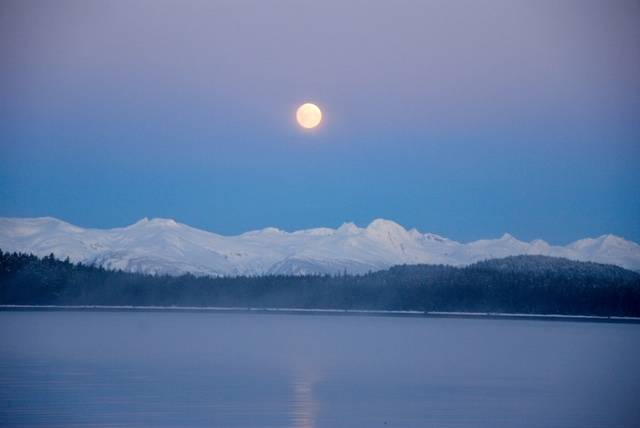 This photo shows the moon over the Chilkat Mountains on Feb. 26. (Courtesy Photo / Bill Andrews)