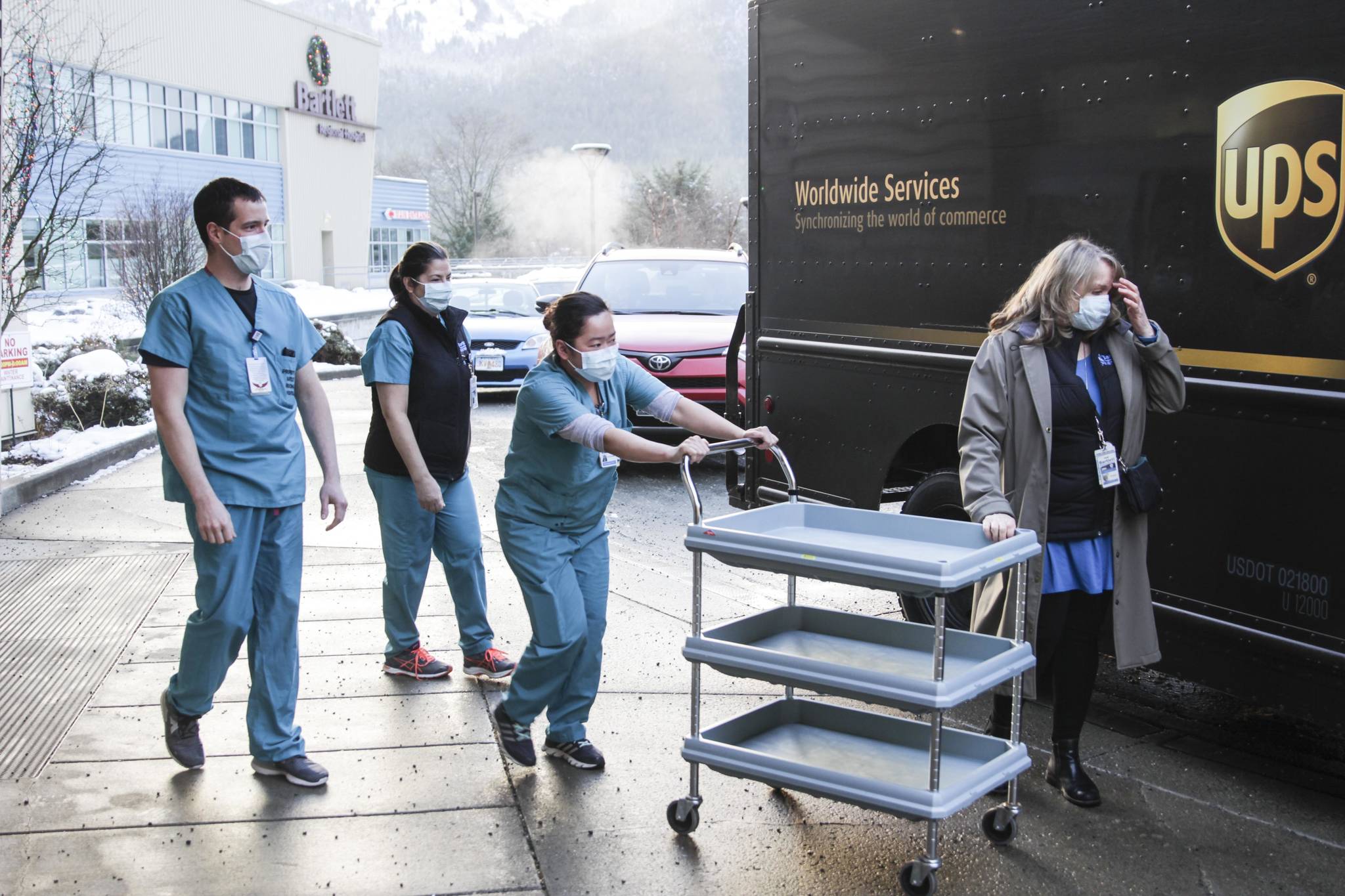 In this December 2020 photo, Bartlett Regional Hospital pharmacy personnel take delivery of the first shipment of the coronavirus vaccine. The state announced Tuesday it was making the vaccine available to all Alaskans starting March 10. (Michael S. Lockett / Juneau Empire File)